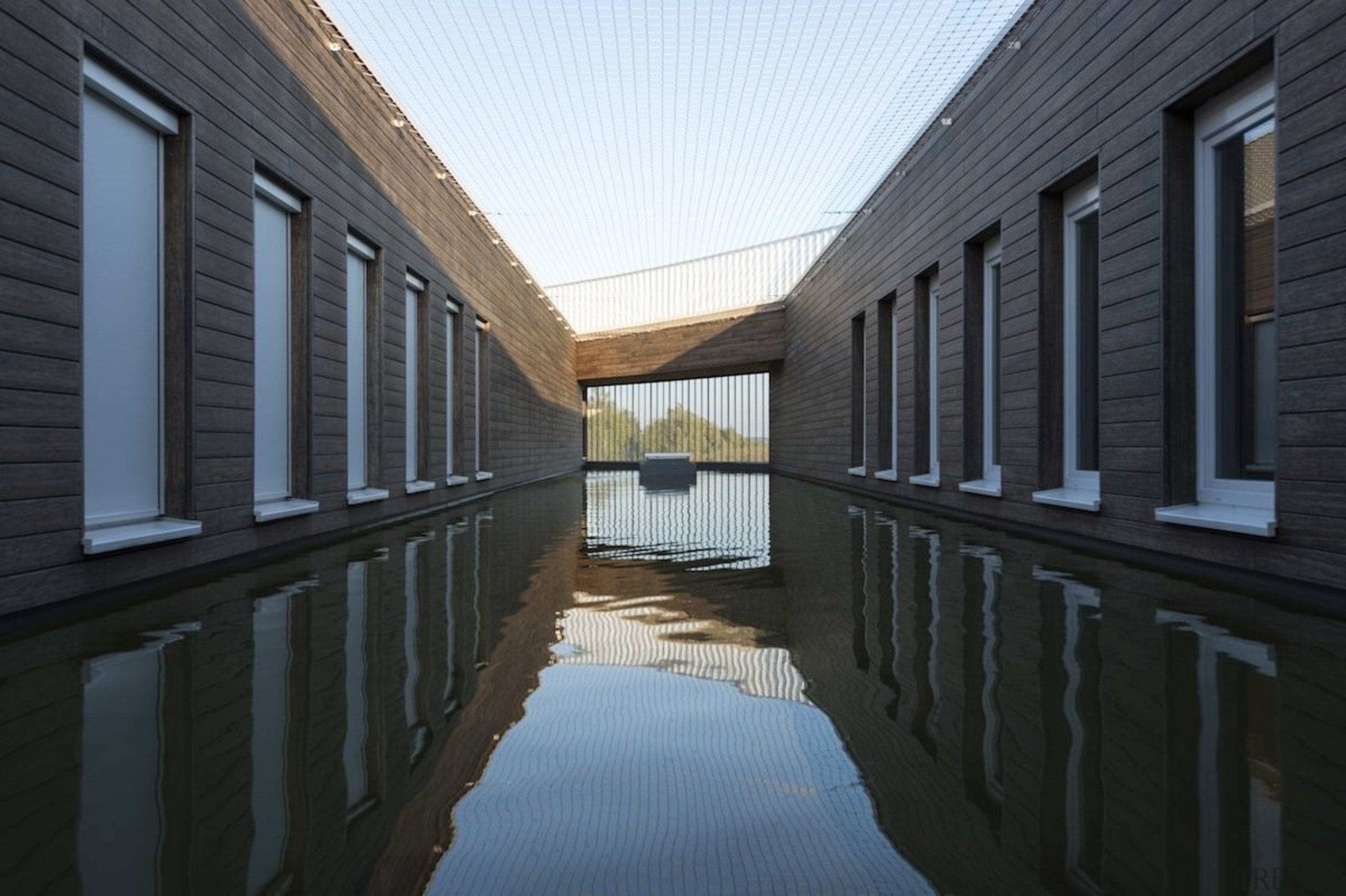 569 firestation - 569 firestation - architecture | architecture, building, daylighting, home, house, reflection, water, window, black