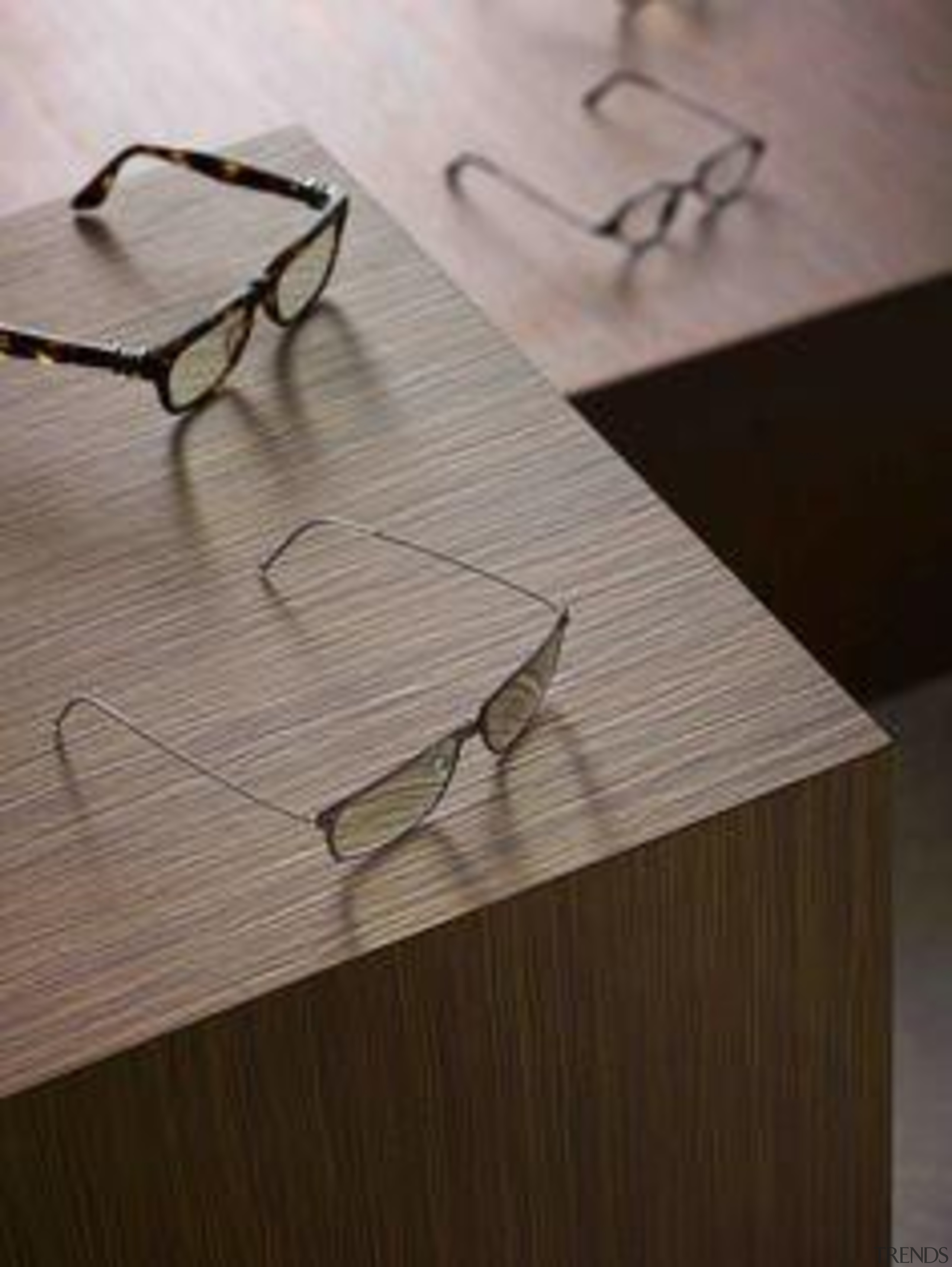 Styling Wendy Bannister. Photography Earl Carter - Laminex eyewear, floor, furniture, glasses, plywood, product design, table, vision care, wood, wood stain, gray