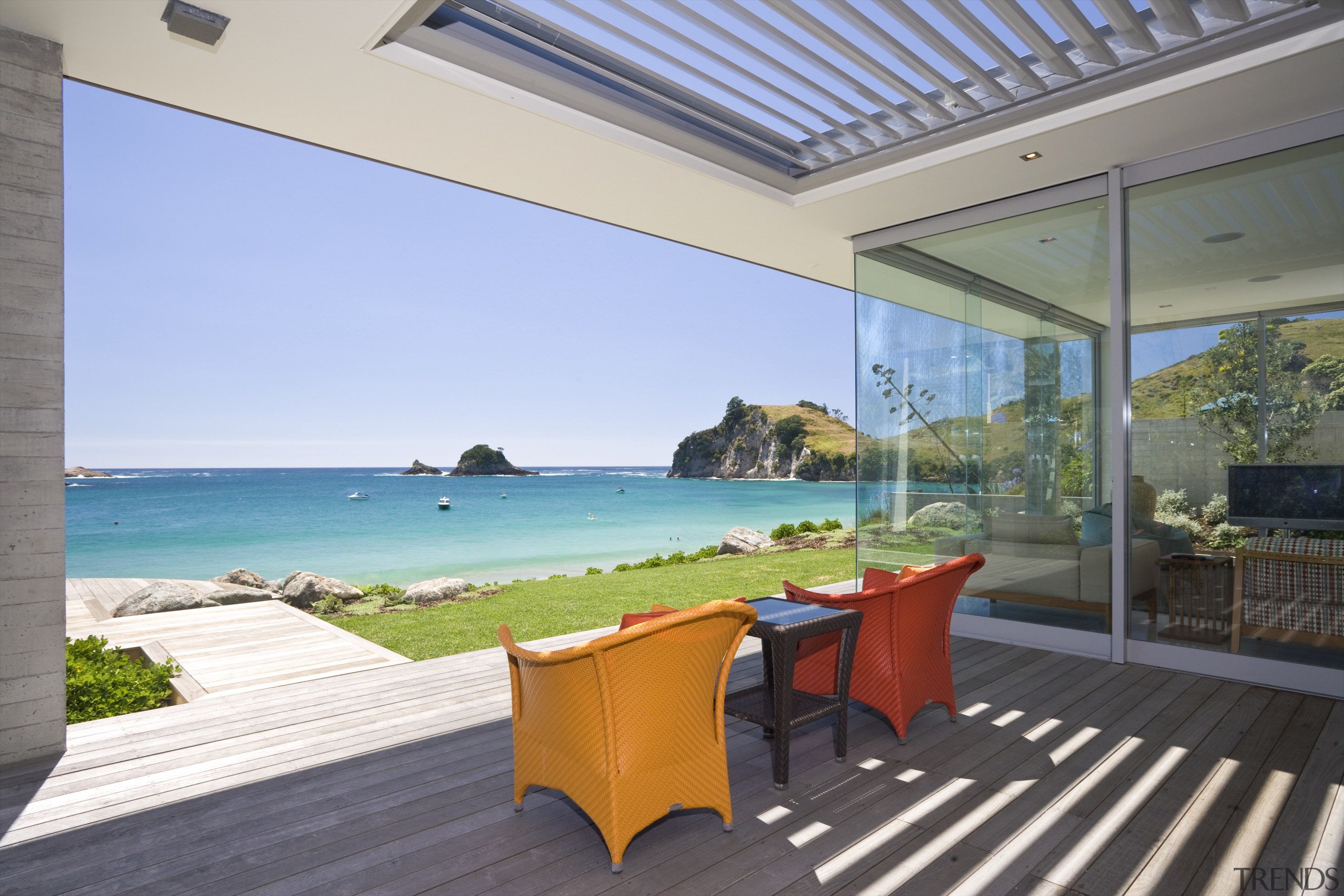 View of the deck area with red and apartment, estate, home, house, property, real estate, resort, vacation, villa, gray, teal