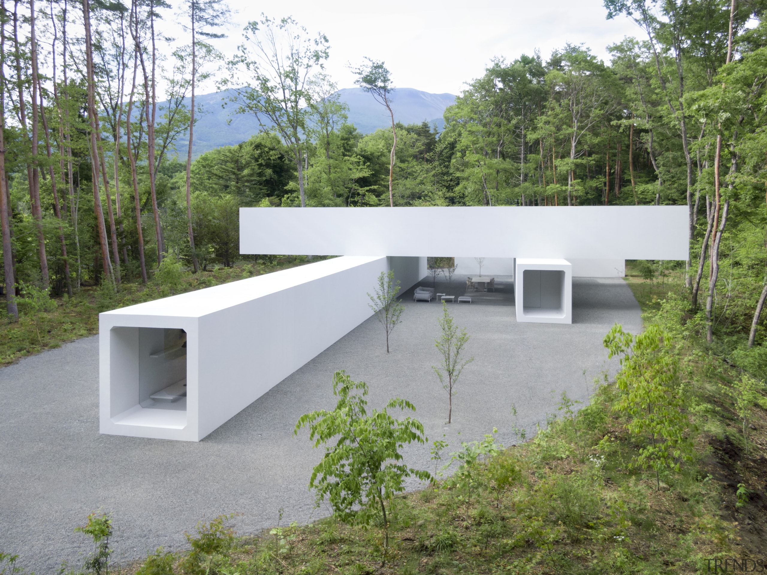 The guest house comprises box-shaped concrete structures used 