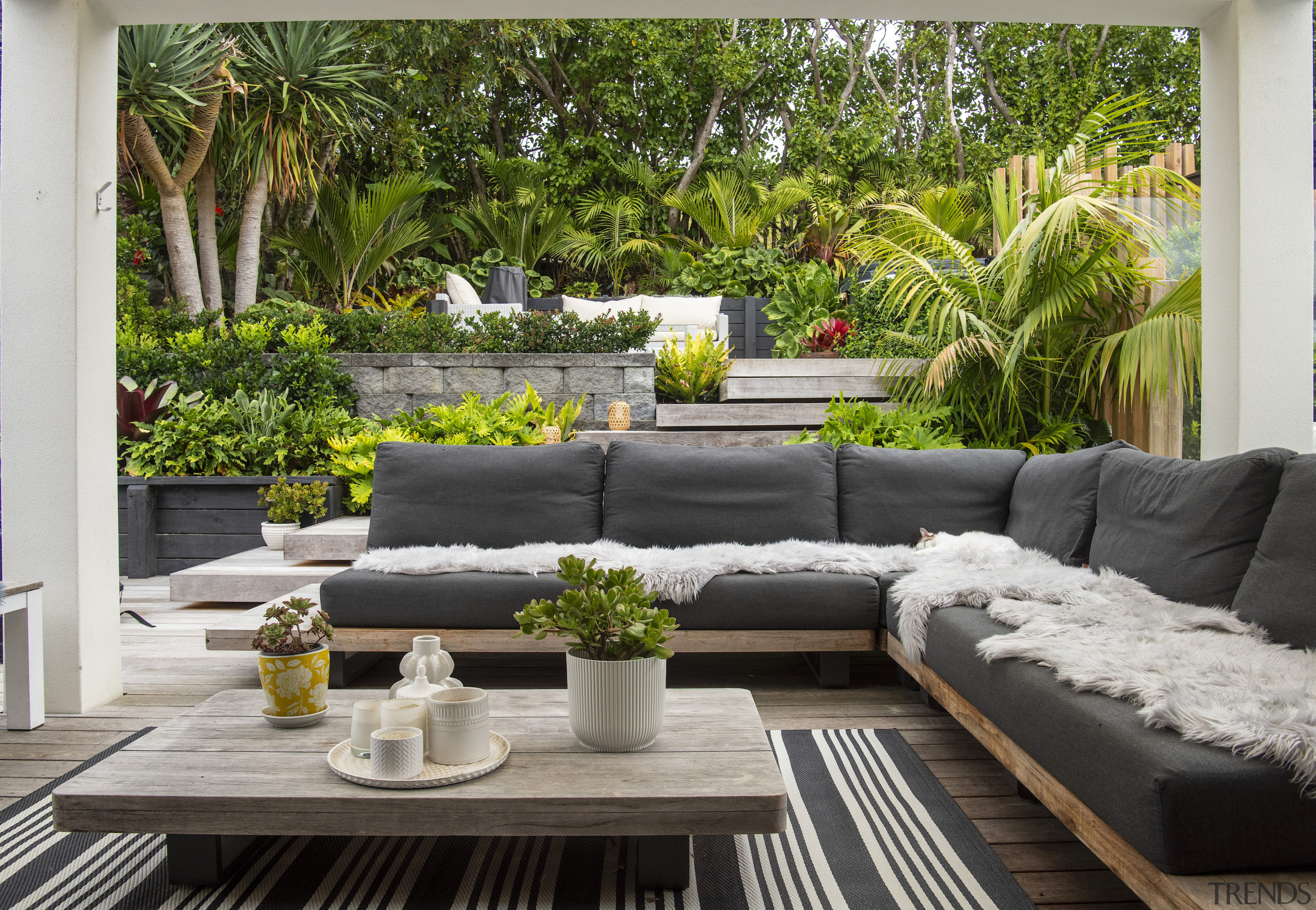 The covered al fresco lounge at pool side. 
