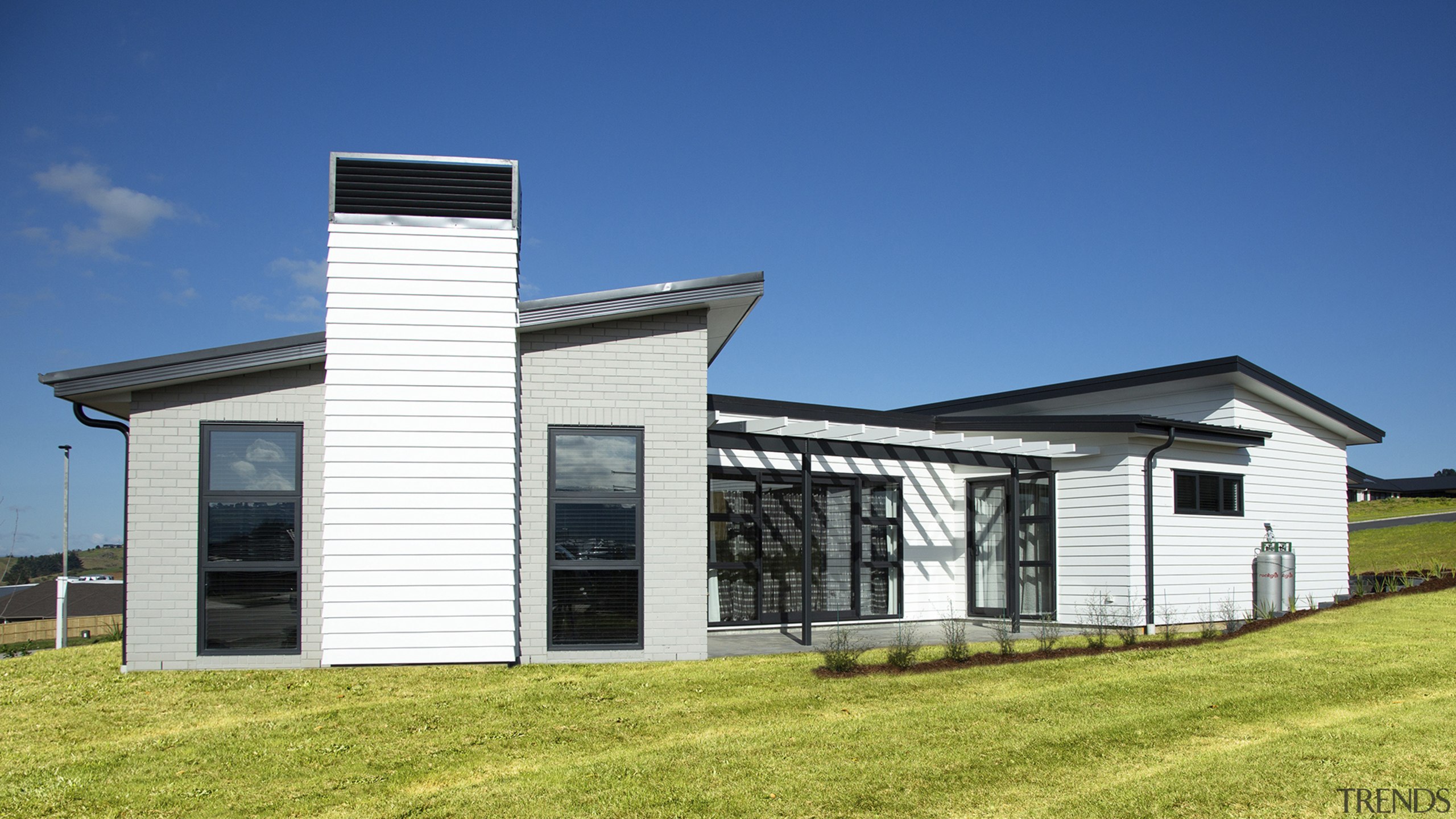 See more GJ Gardner Homes here: www.gjgardner.co.nz cottage, elevation, facade, home, house, property, real estate, siding, blue