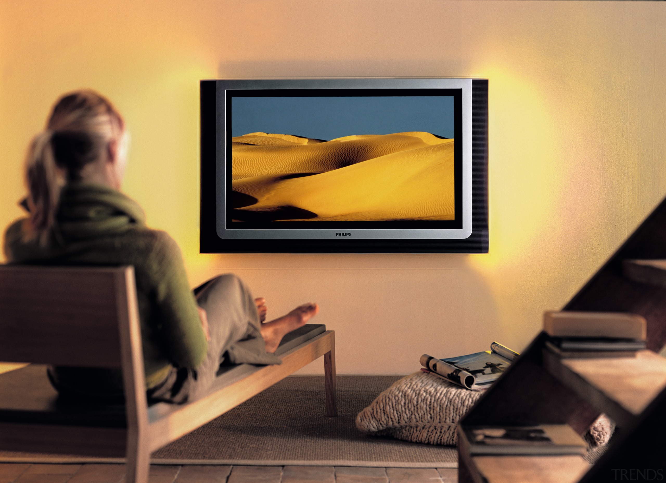 view of the phillips widescreen lcd/plasma tv - display device, electronic device, furniture, interior design, media, modern art, room, technology, television, orange, black