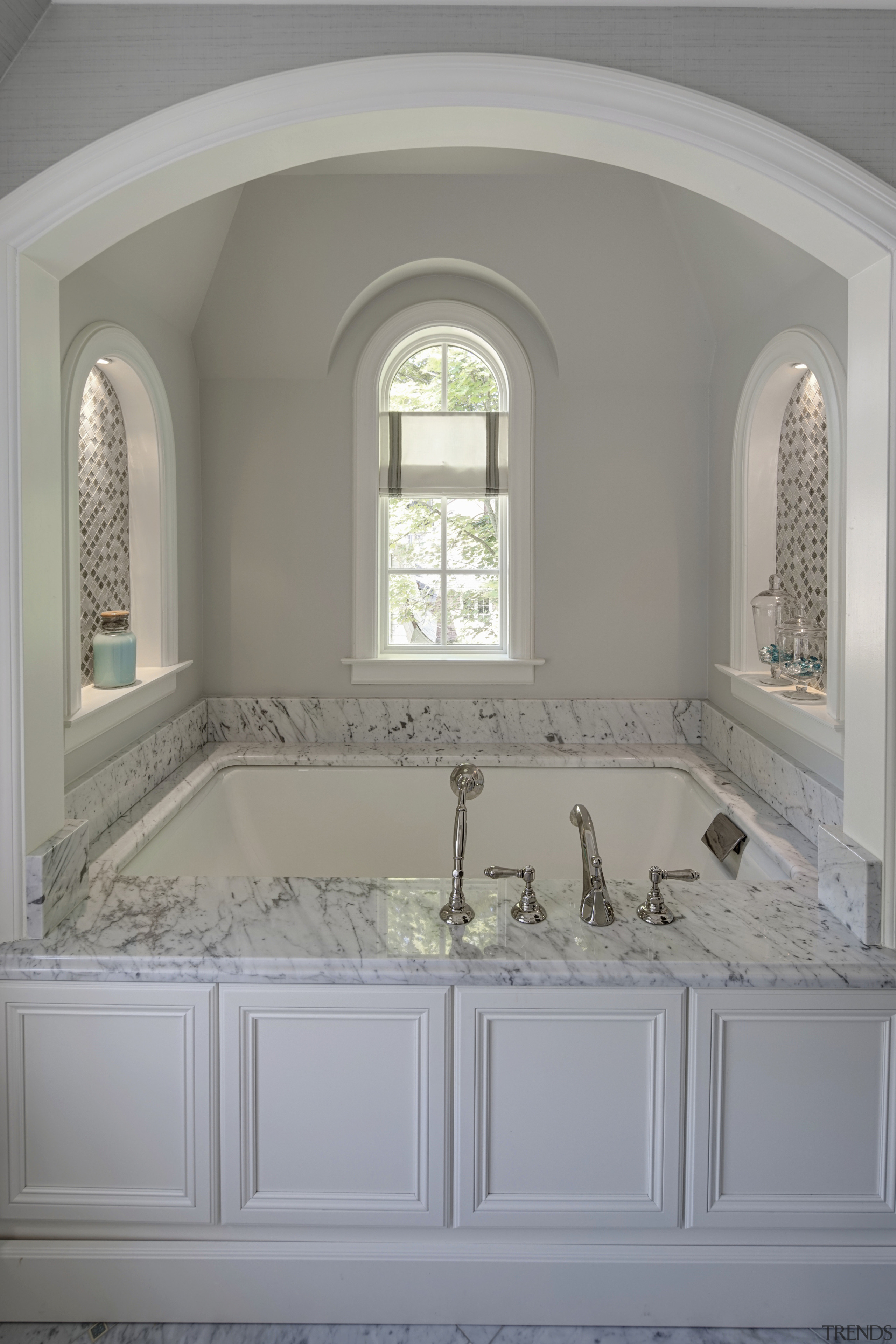 Bathtub in traditional bathroom suite with marble surfaces architecture, bathroom, bathroom accessory, ceiling, daylighting, estate, floor, home, interior design, room, sink, wall, window, gray