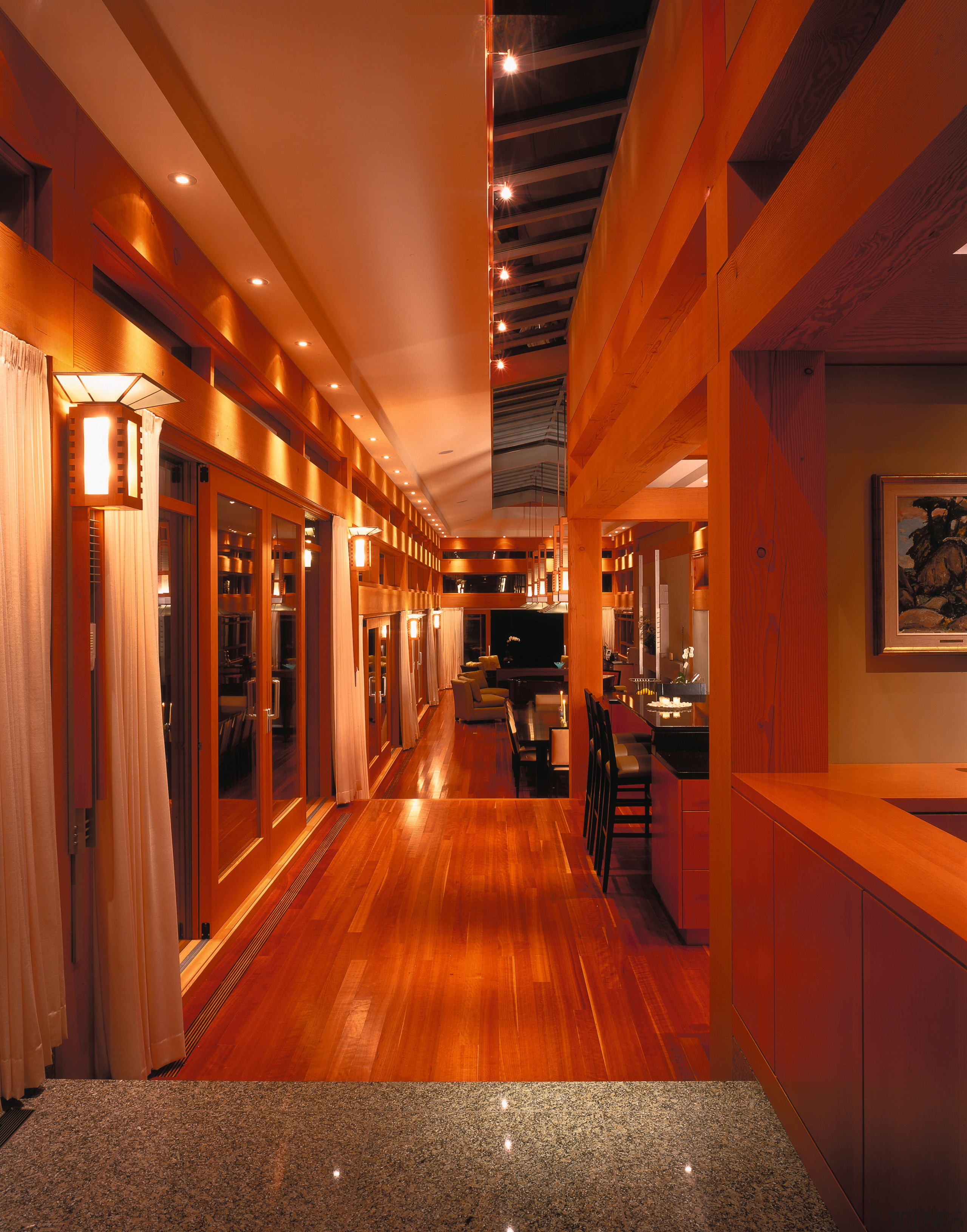 view of the corridor that forms the spine ceiling, flooring, home, interior design, lighting, lobby, wood, red