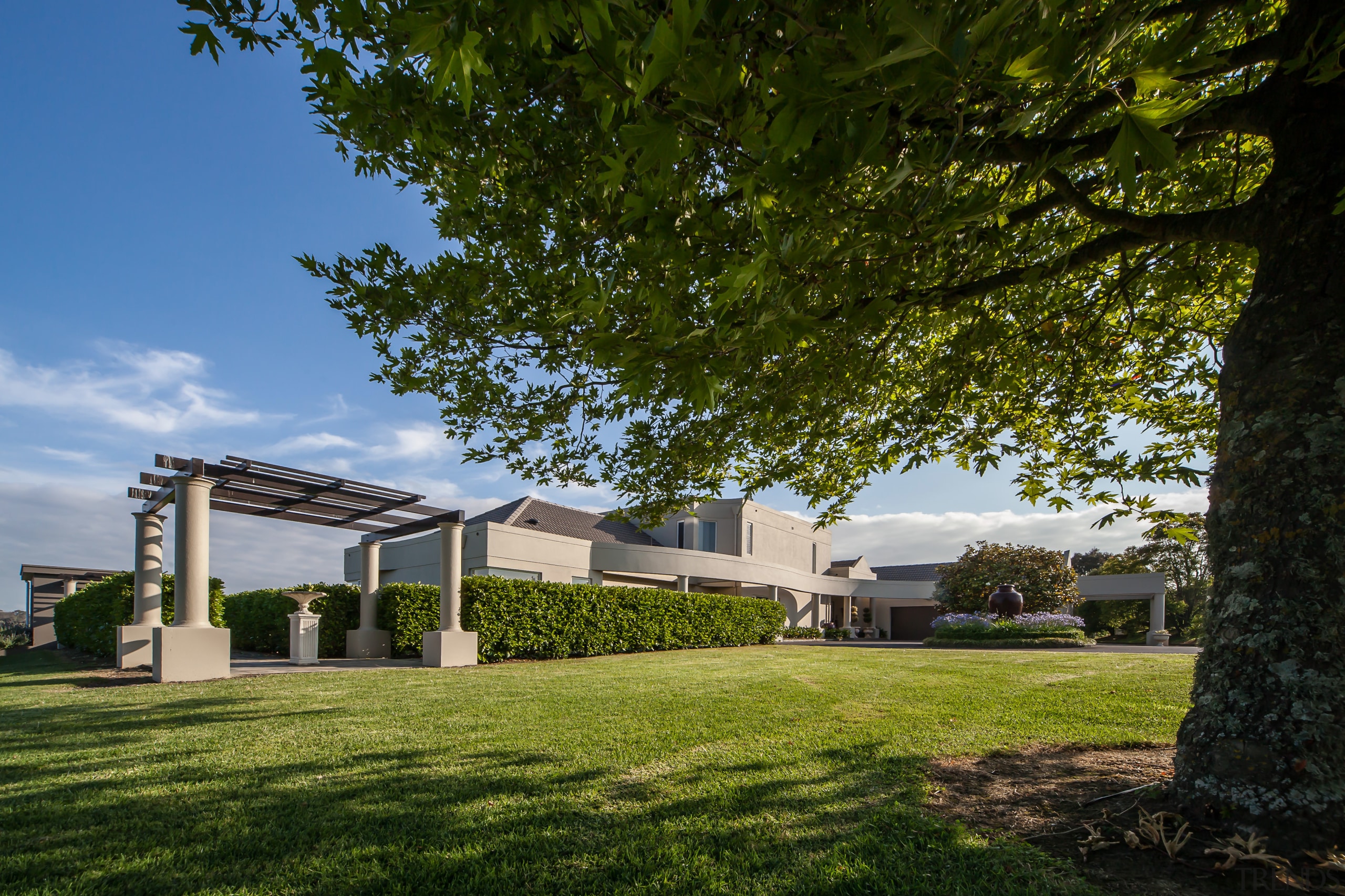 Extended landscaping with windbreaks is a key feature architecture, cottage, estate, farmhouse, grass, home, house, landscape, lawn, property, real estate, residential area, sky, tree, brown