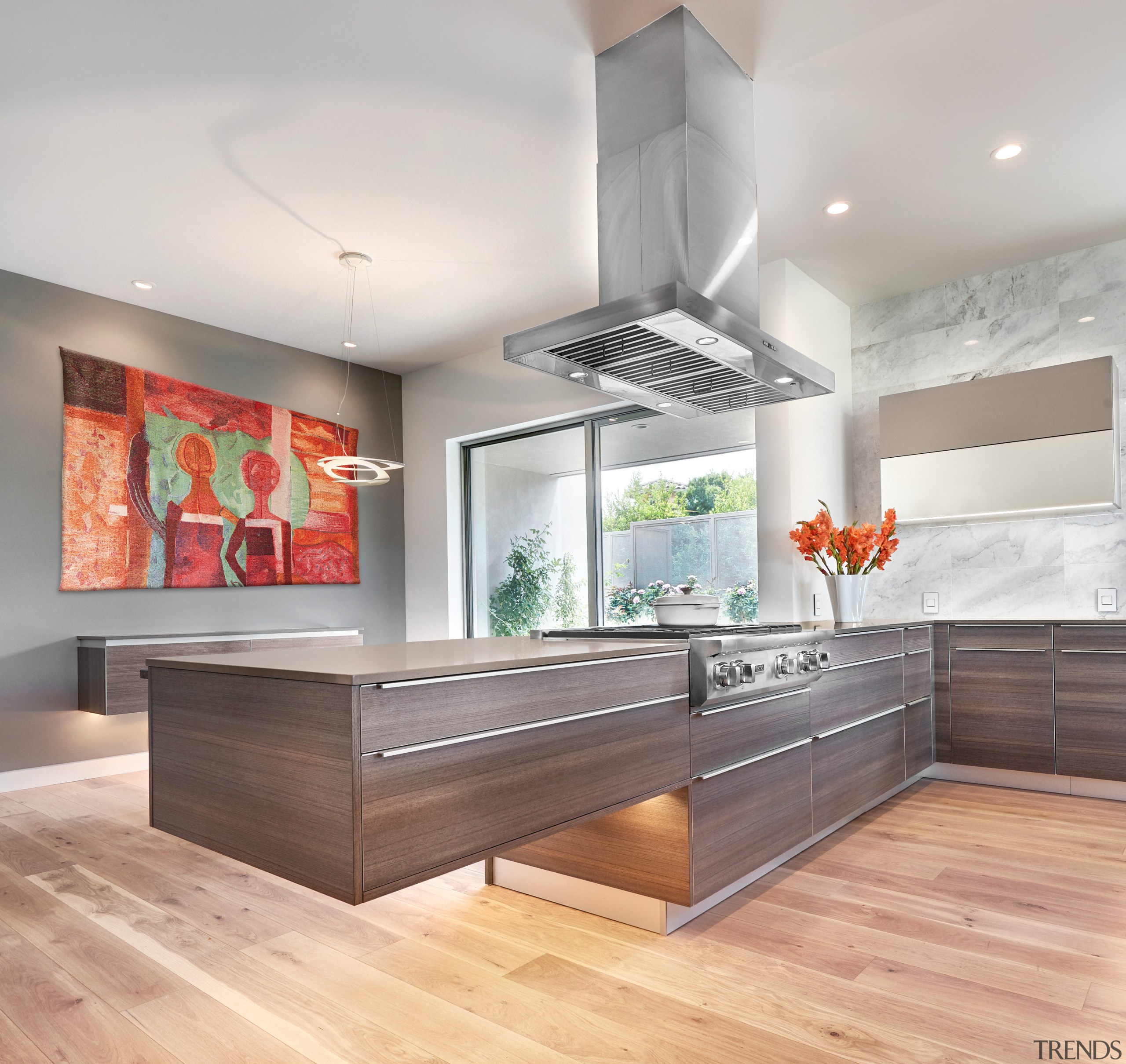 This kitchens subdued colour palette, refined, minimalist cabinetry ceiling, countertop, floor, interior design, kitchen, gray