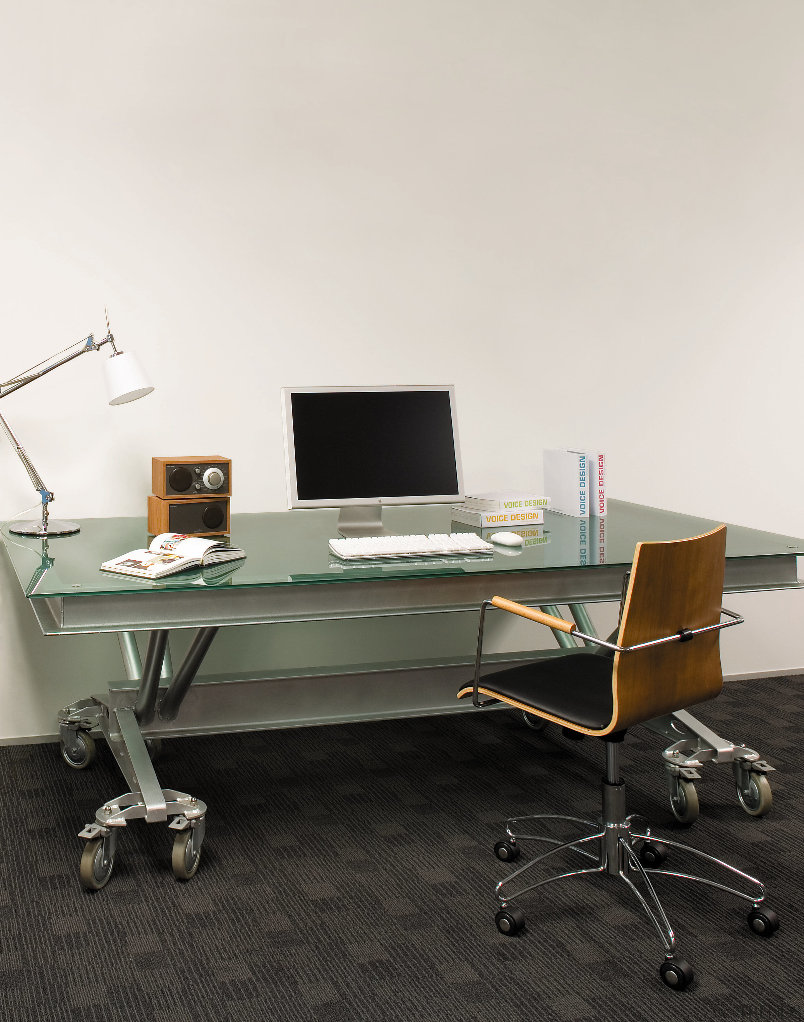 view of the treds office featuring blue featuring, angle, desk, furniture, office, office chair, product design, table, white, black