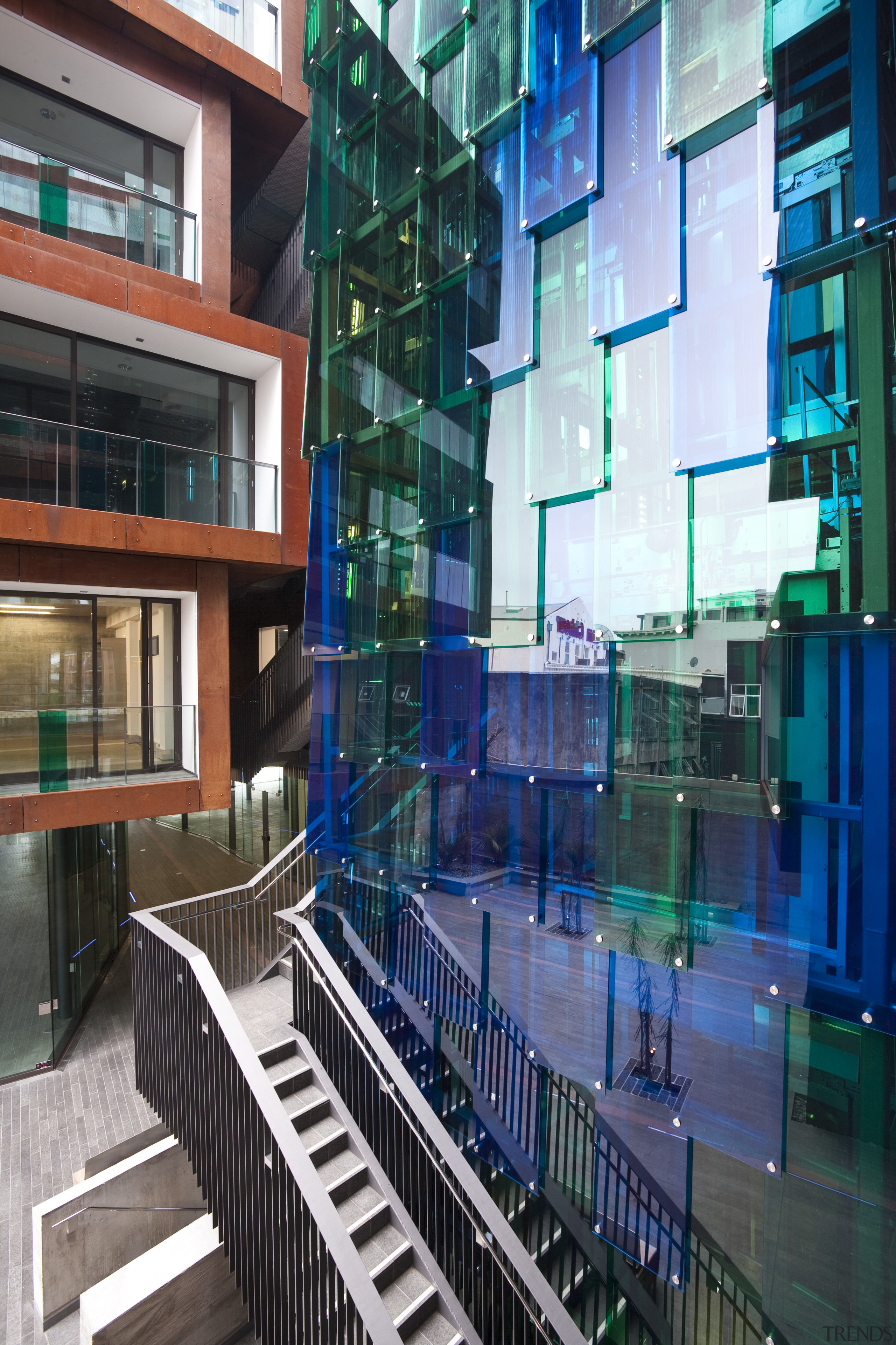 Exterior view of the Ironbank building which features apartment, architecture, building, commercial building, condominium, daylighting, facade, glass, lobby, metropolis, metropolitan area, mixed use, window