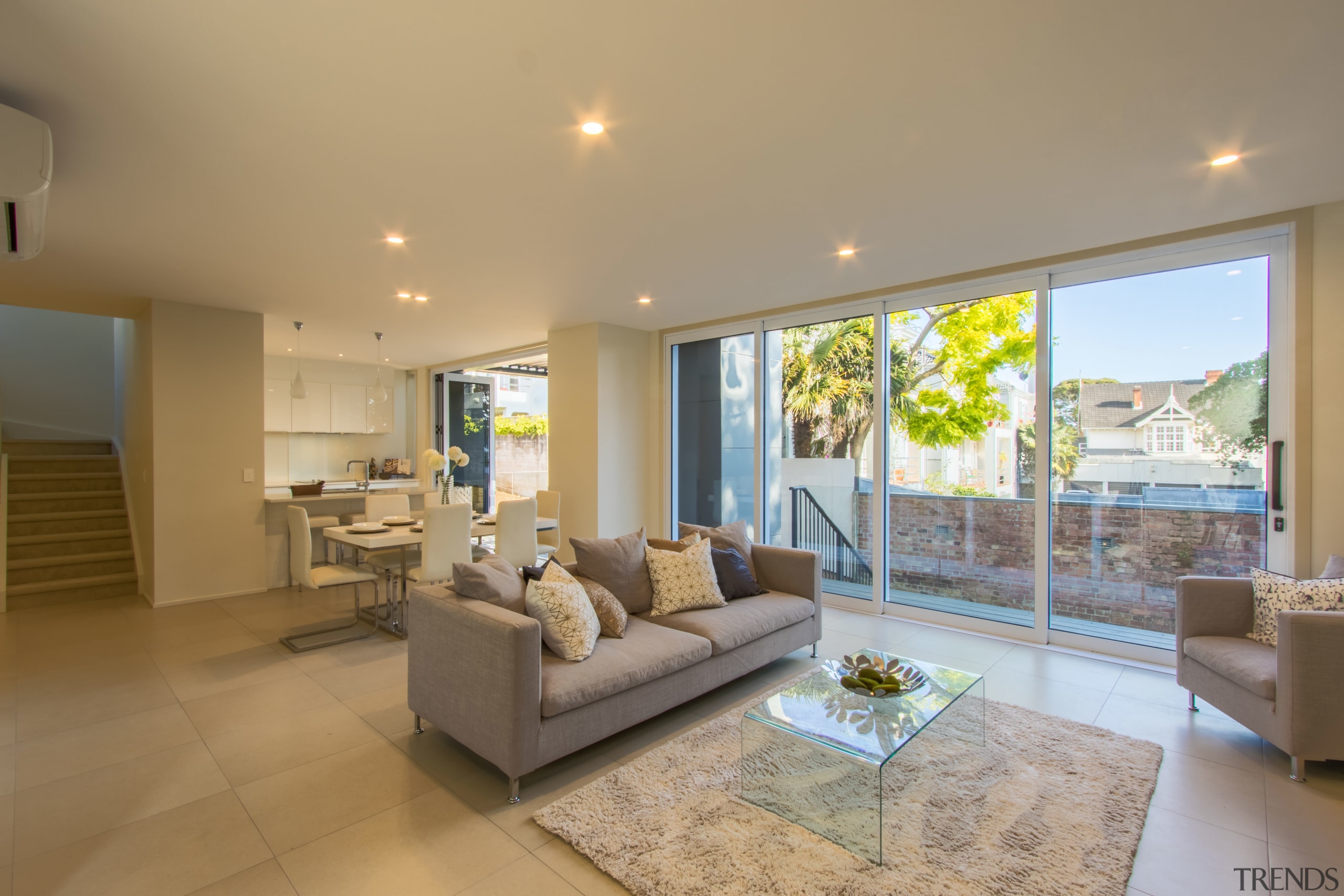 Floor-to-ceiling glazing features in St Georges Bay Road ceiling, estate, floor, home, house, interior design, living room, property, real estate, room, window, brown, gray