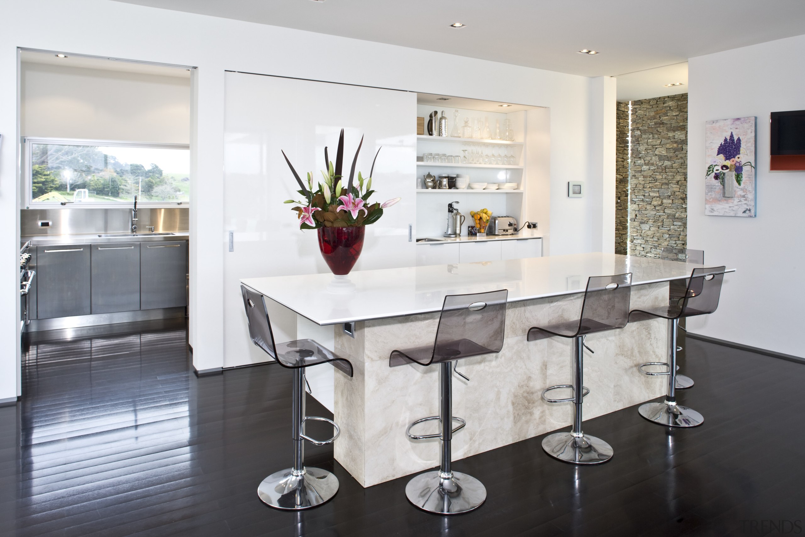 Image of the kitchen and the dining room countertop, dining room, furniture, interior design, kitchen, property, real estate, table, white