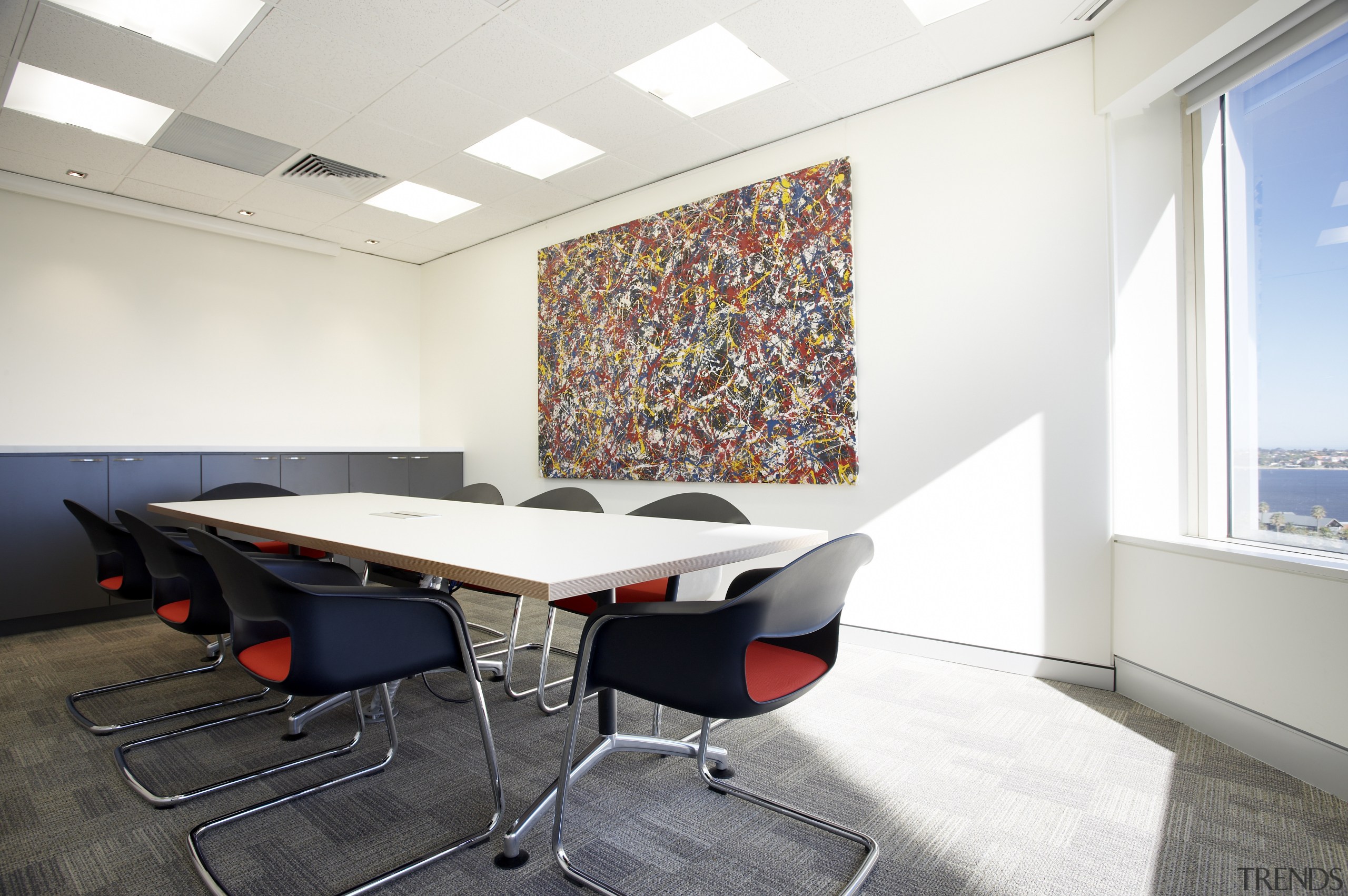 View of the boardroom which features carpeted flooring, conference hall, desk, furniture, interior design, office, product design, real estate, table, white