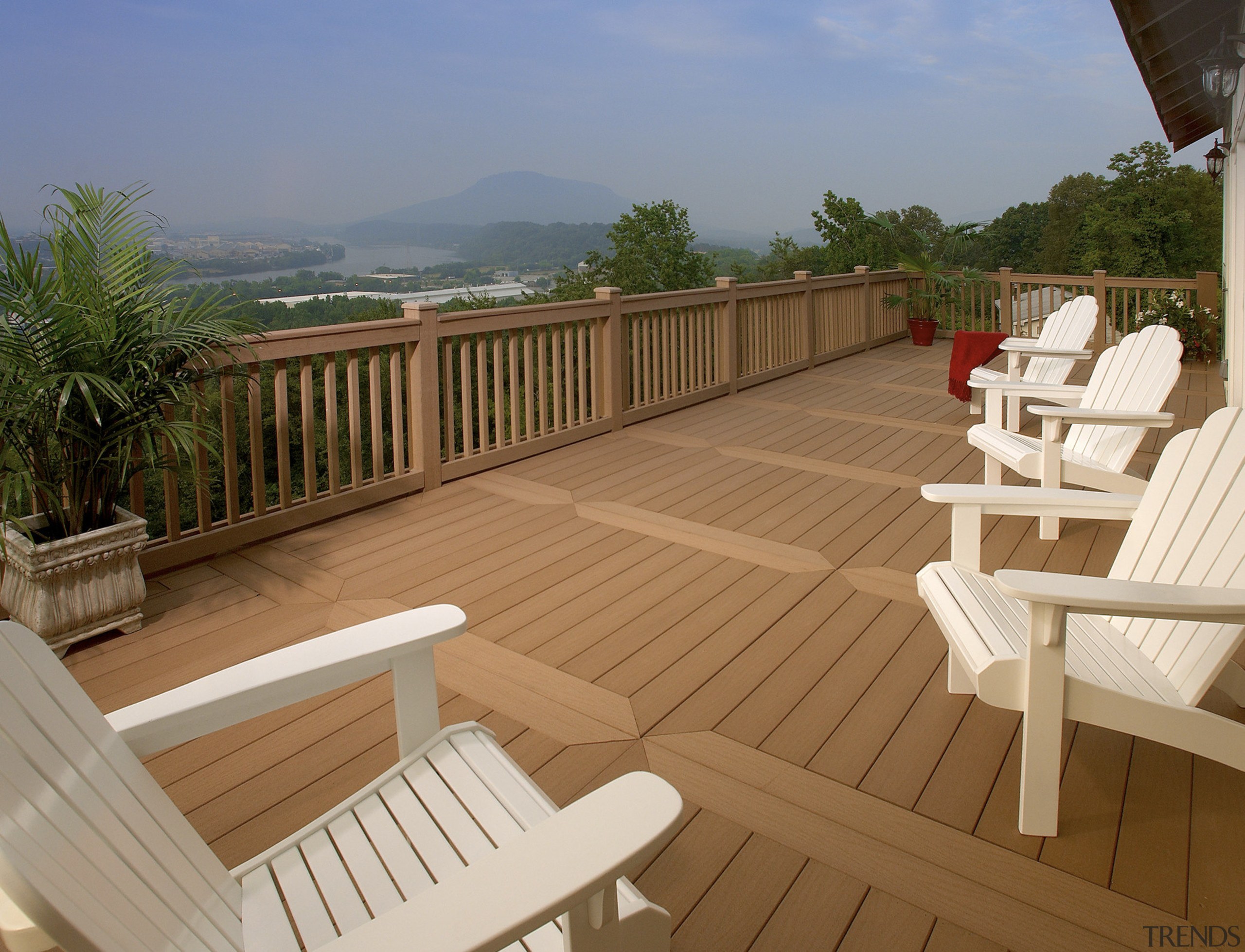 View of deck by WeatherBest Decking &amp; Railing. deck, floor, hardwood, outdoor furniture, outdoor structure, property, real estate, sunlounger, wood, wood stain, brown