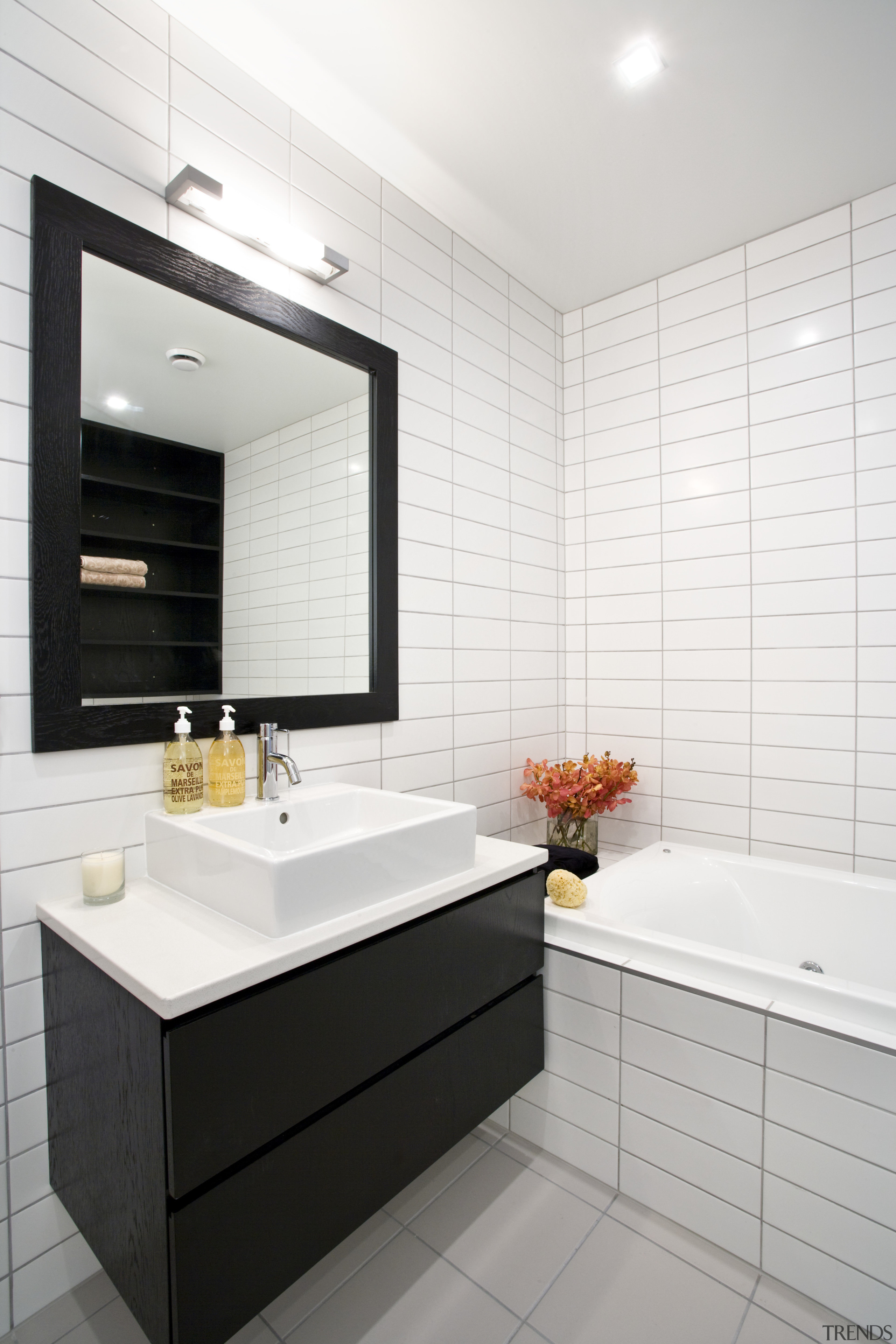 interior view of a chews lane development apartment bathroom, bathroom accessory, bathroom cabinet, countertop, floor, interior design, product design, room, sink, tile, white