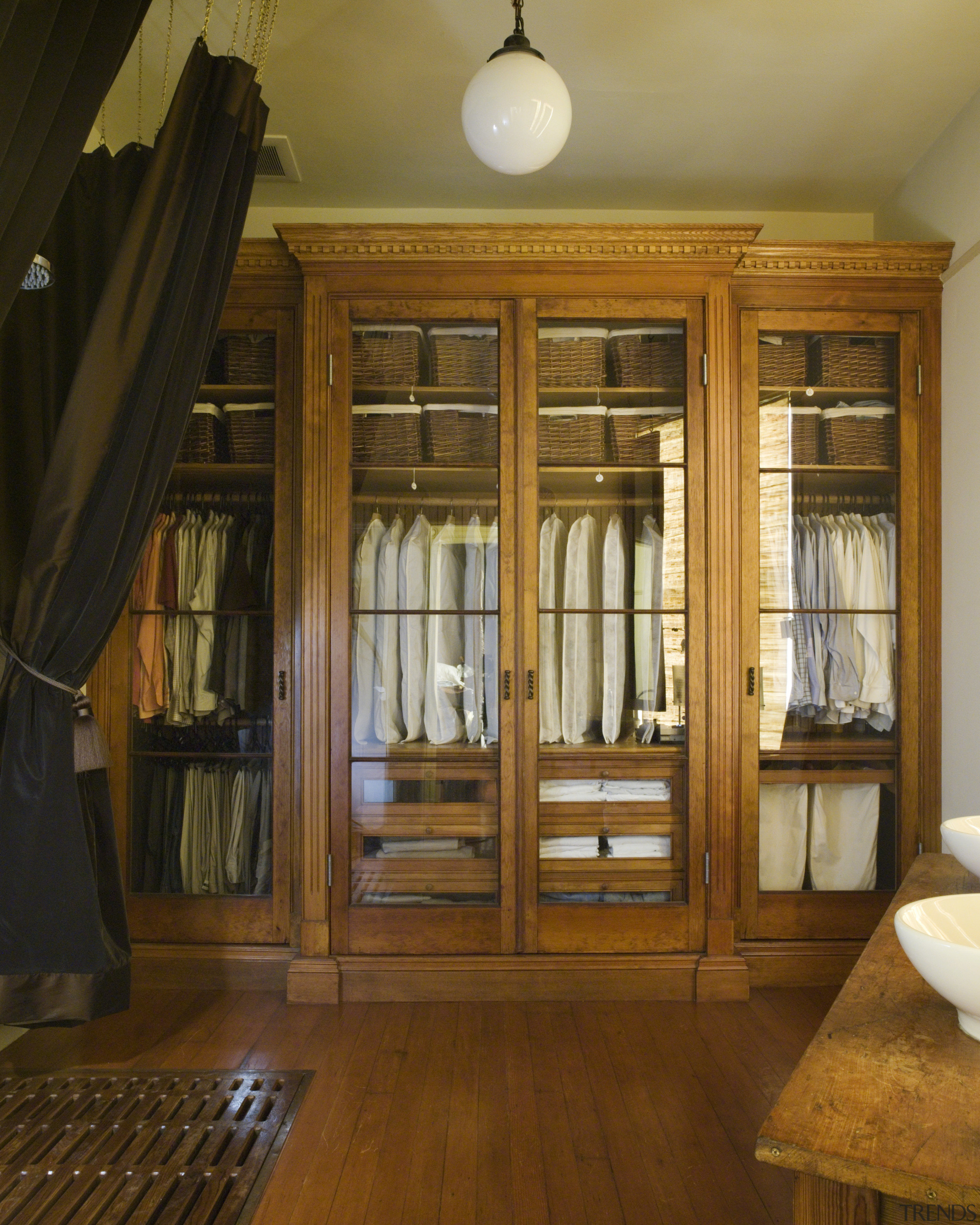 a view of this closet  constructed out cabinetry, ceiling, door, floor, flooring, furniture, hardwood, home, interior design, room, window, wood, wood flooring, wood stain, brown