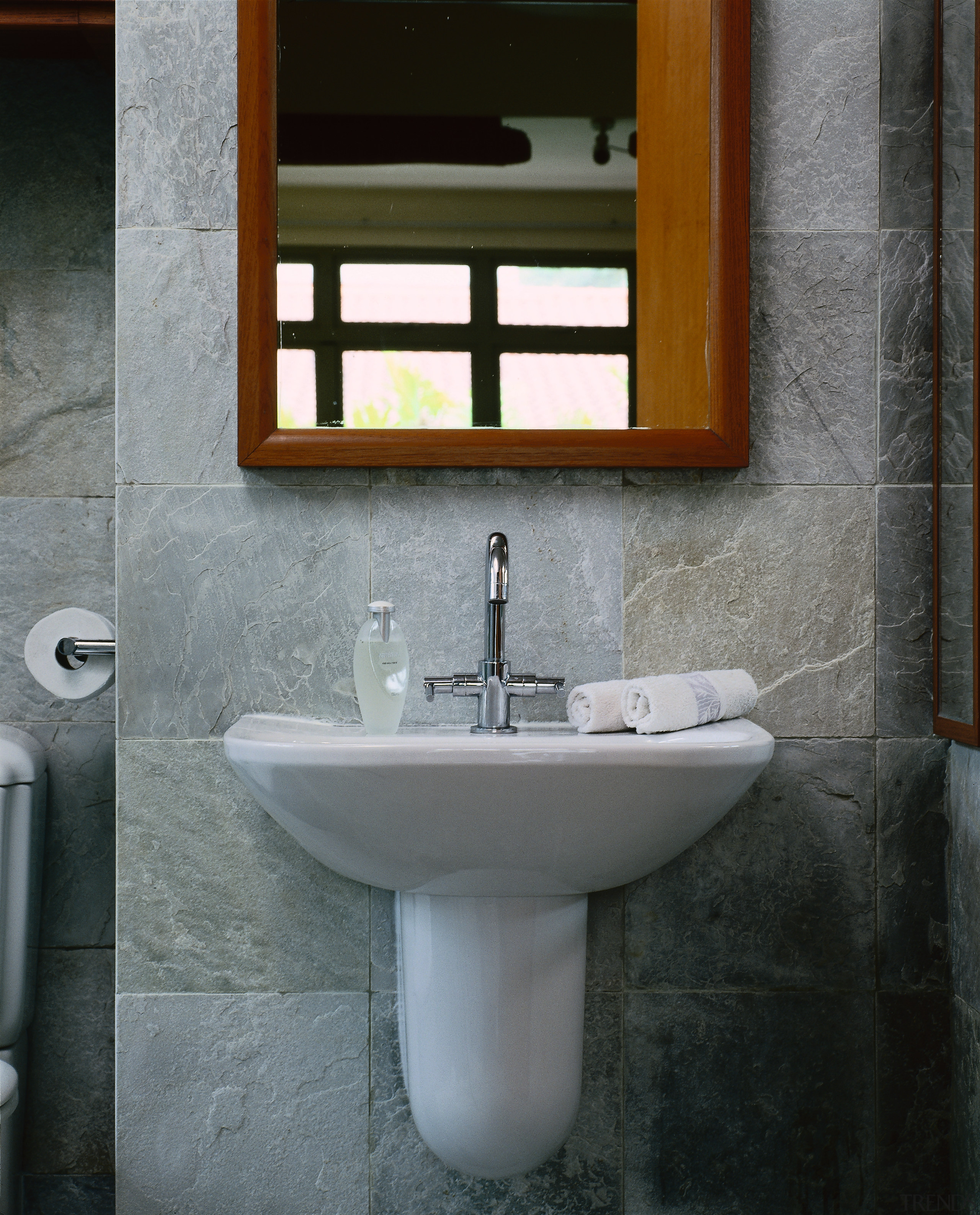 The detail of a white wall mounted basin bathroom, bathroom accessory, bathroom cabinet, bidet, ceramic, interior design, plumbing fixture, sink, tap, gray, black