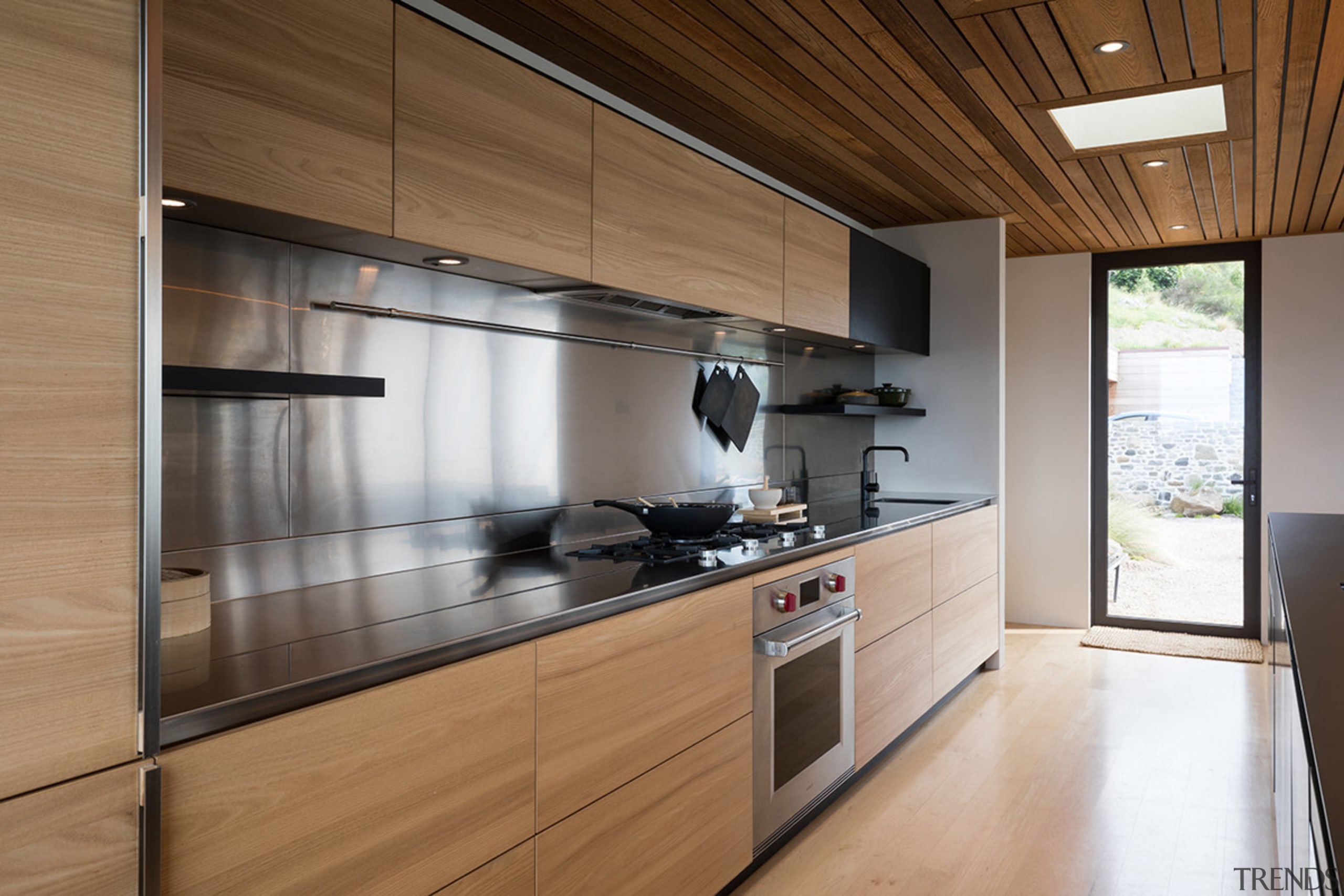 An integrated extraction unit and a &nbsp;large stainless cabinetry, countertop, cuisine classique, interior design, kitchen, real estate, brown
