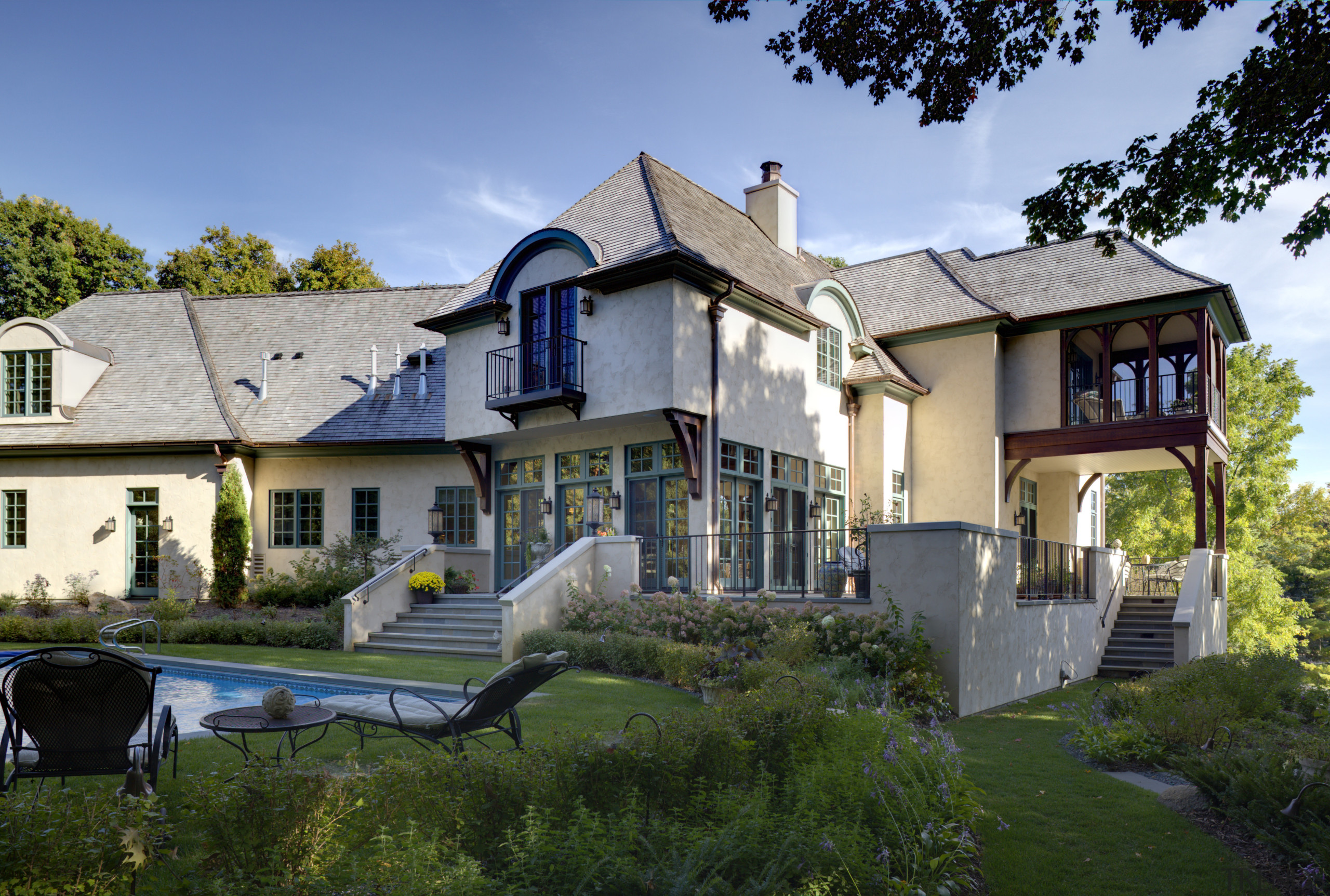 White walls and crown mouldings. Neutral furniture colours. building, cottage, elevation, estate, facade, home, house, mansion, neighbourhood, property, real estate, residential area, suburb, villa, window, teal