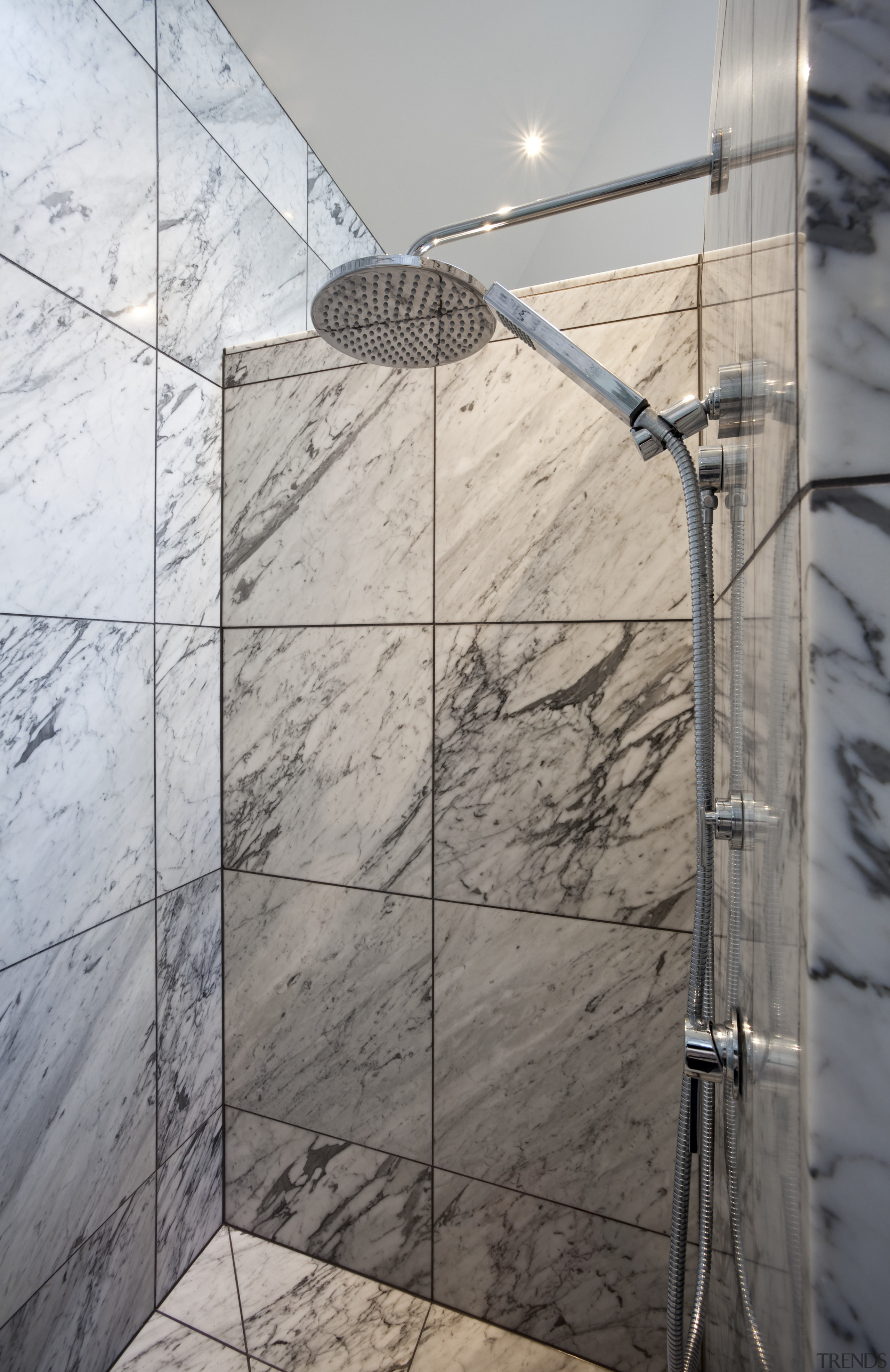 View of bedroom and bathroom with grey, black architecture, glass, plumbing fixture, shower, tile, gray