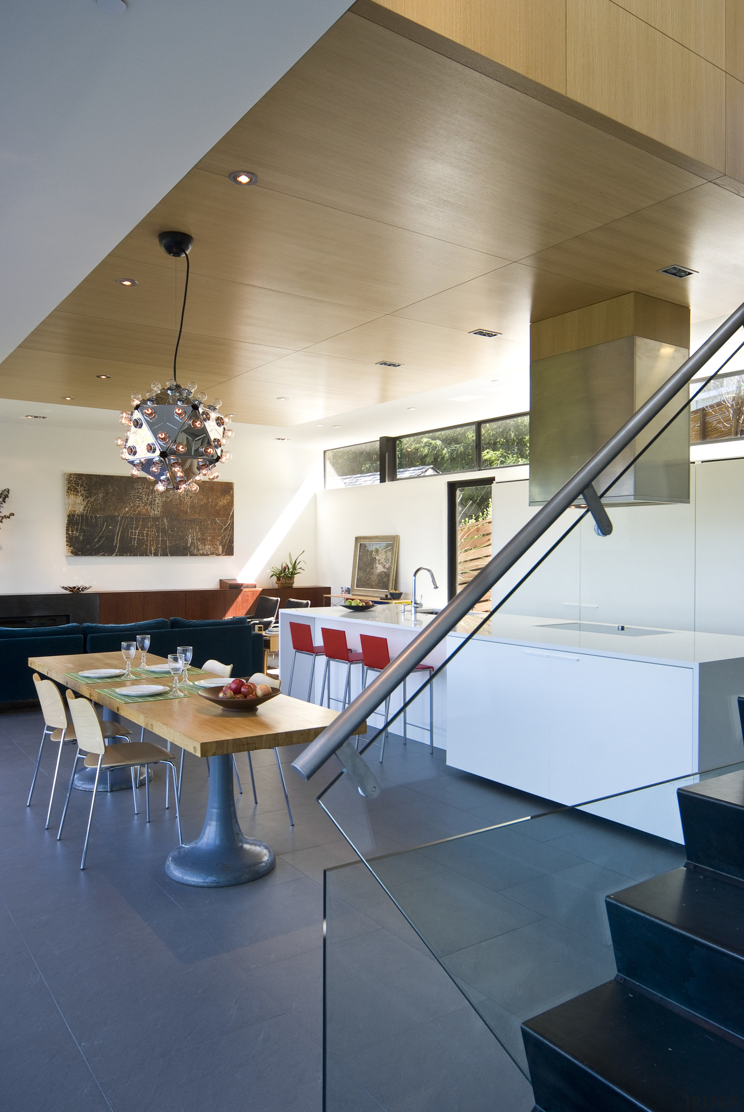 View of kitchen designed by Tim Rempel of architecture, ceiling, countertop, daylighting, floor, glass, house, interior design, kitchen, loft, stairs, table
