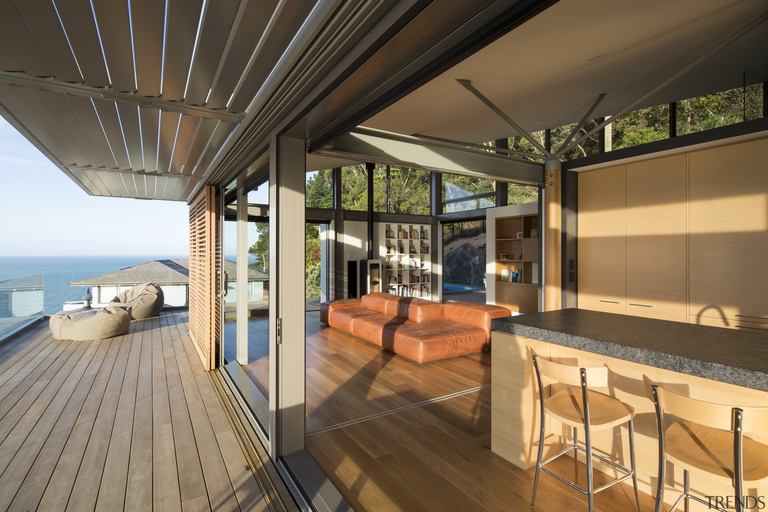 ​​​​​​​Together with the external cedar sliding panels, automatically brown, black