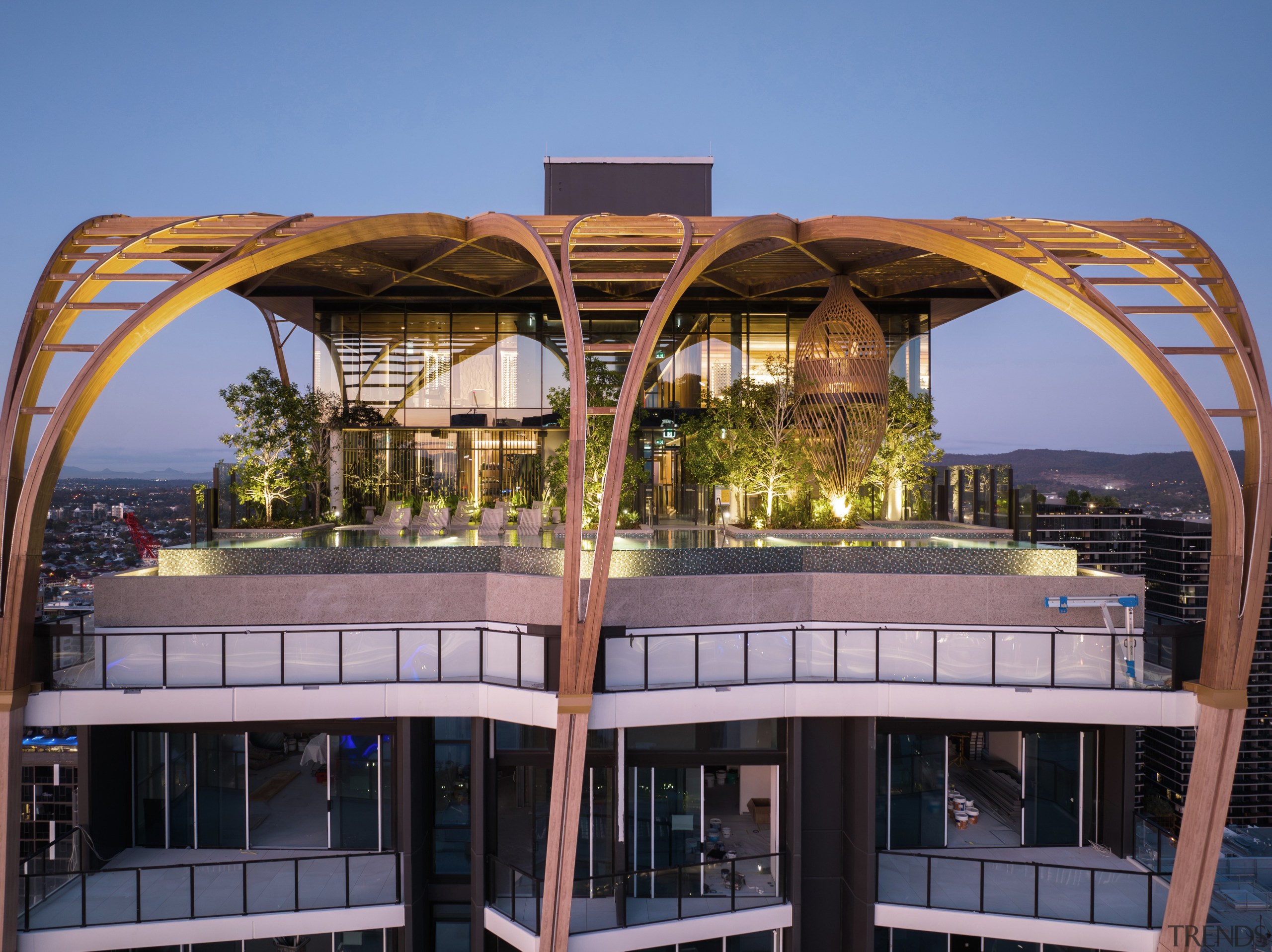 The staggered balcony protrusions balance natural light and 