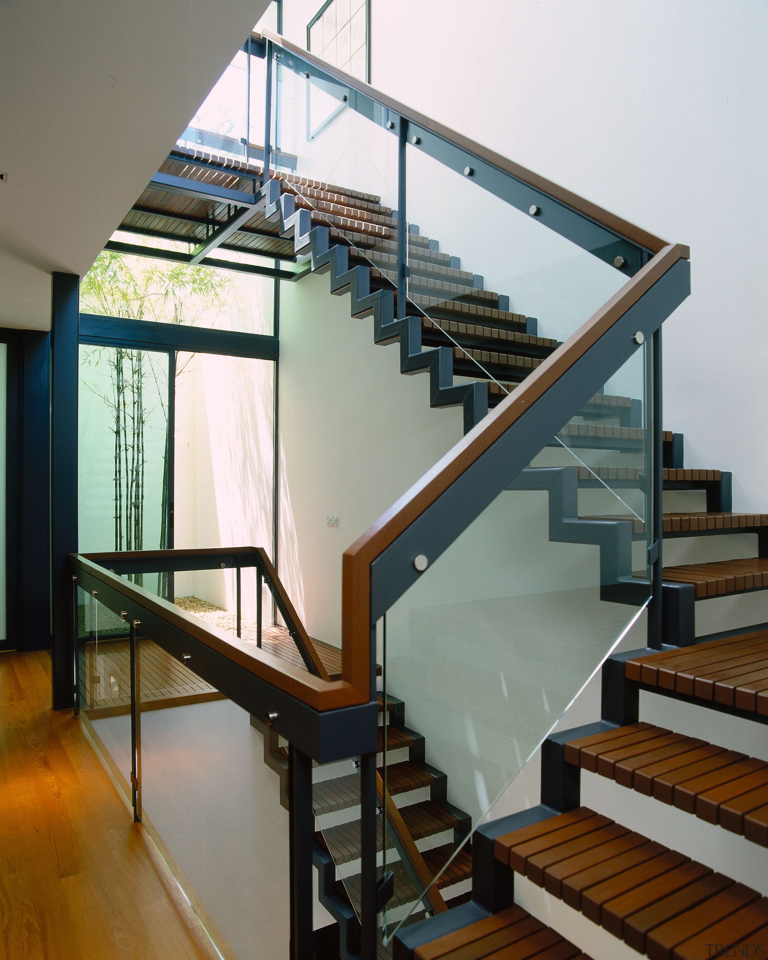 view of the stairway and bamboo courtyard - architecture, baluster, daylighting, glass, handrail, stairs, structure, gray, white