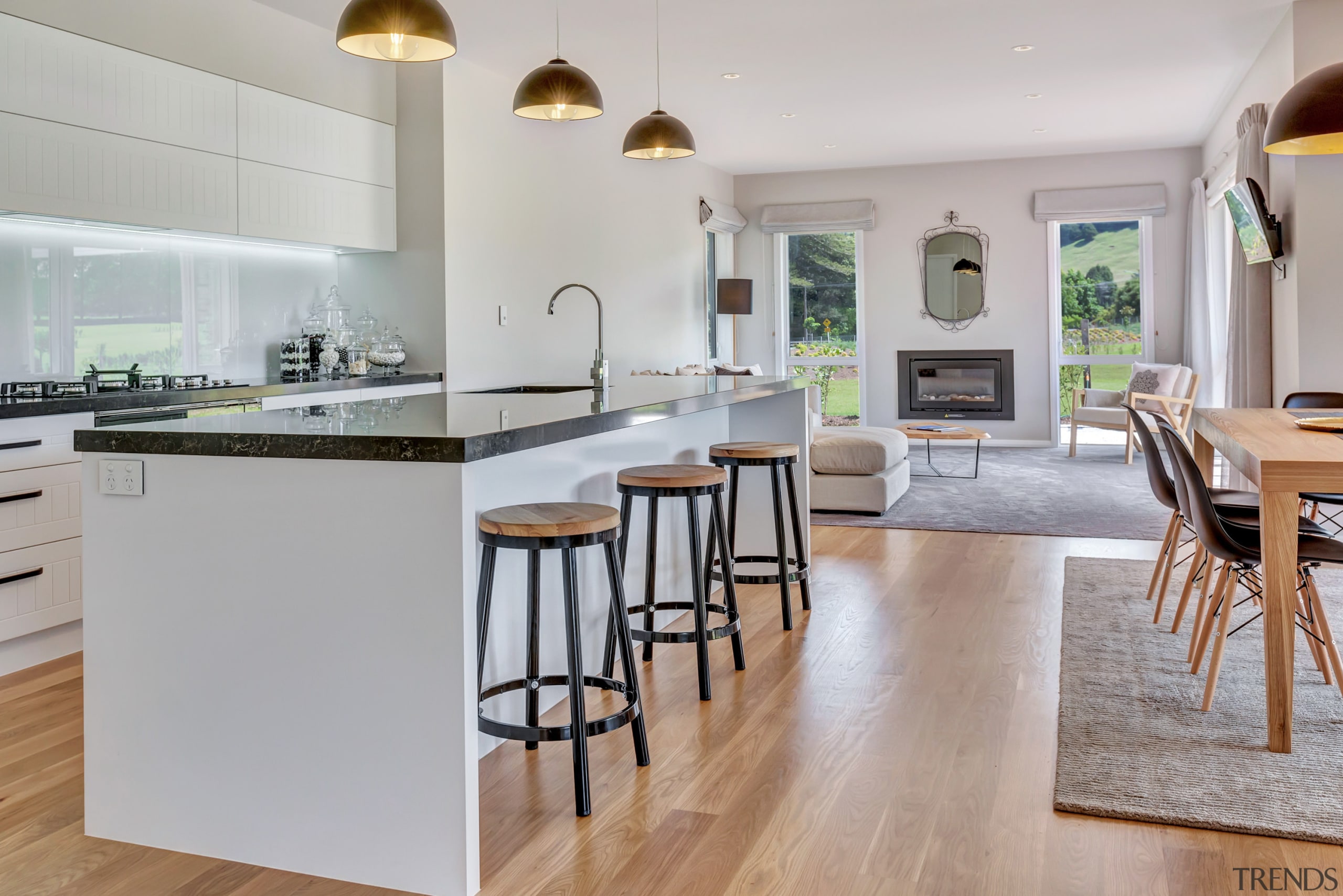 A chefs kitchen with walk-in scullery is at countertop, cuisine classique, floor, flooring, hardwood, interior design, kitchen, laminate flooring, real estate, room, wood flooring, gray