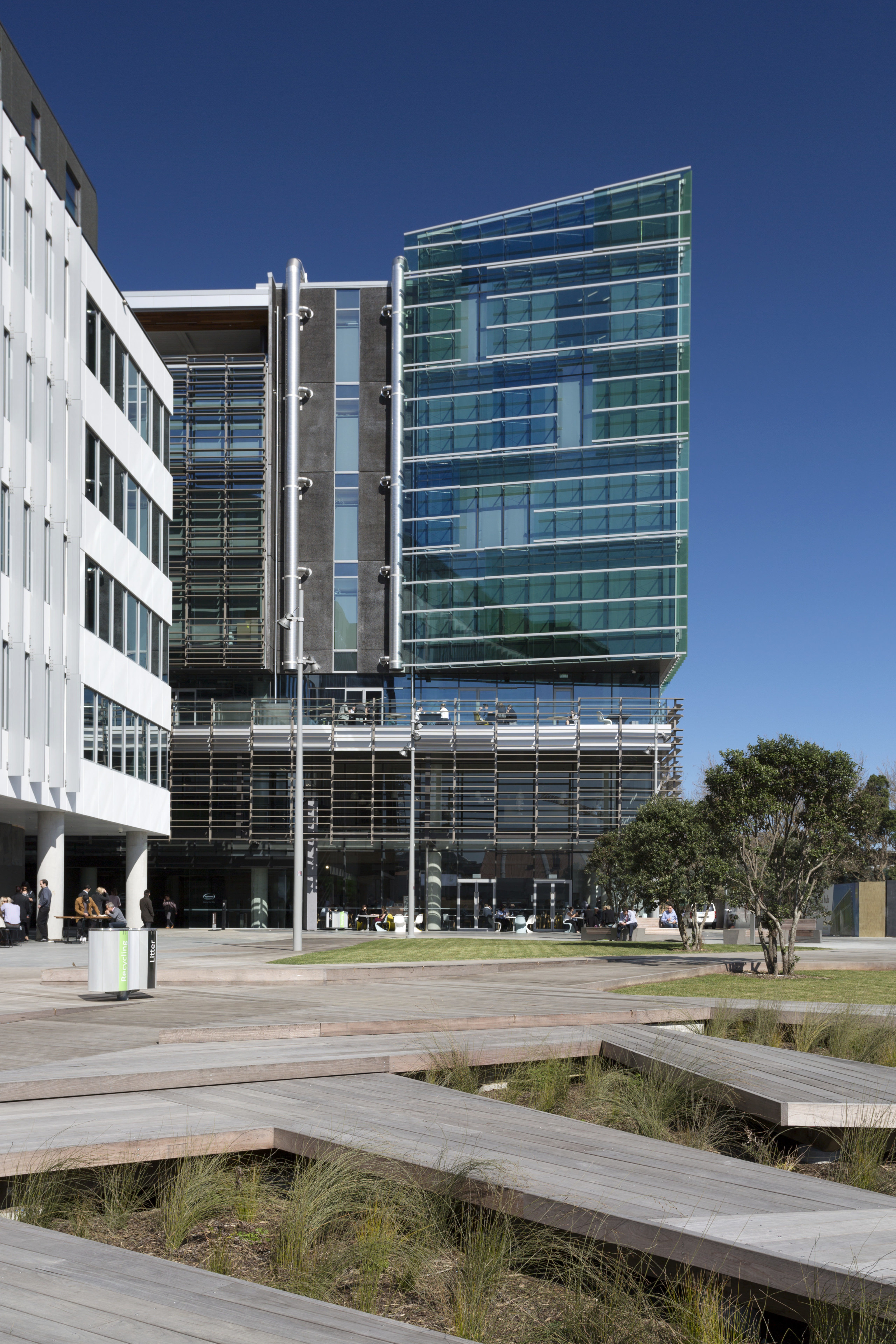 The harbour side of the Fonterra Centre contains apartment, architecture, building, city, commercial building, condominium, corporate headquarters, daytime, facade, headquarters, metropolis, metropolitan area, mixed use, neighbourhood, real estate, residential area, sky, tower block, urban design