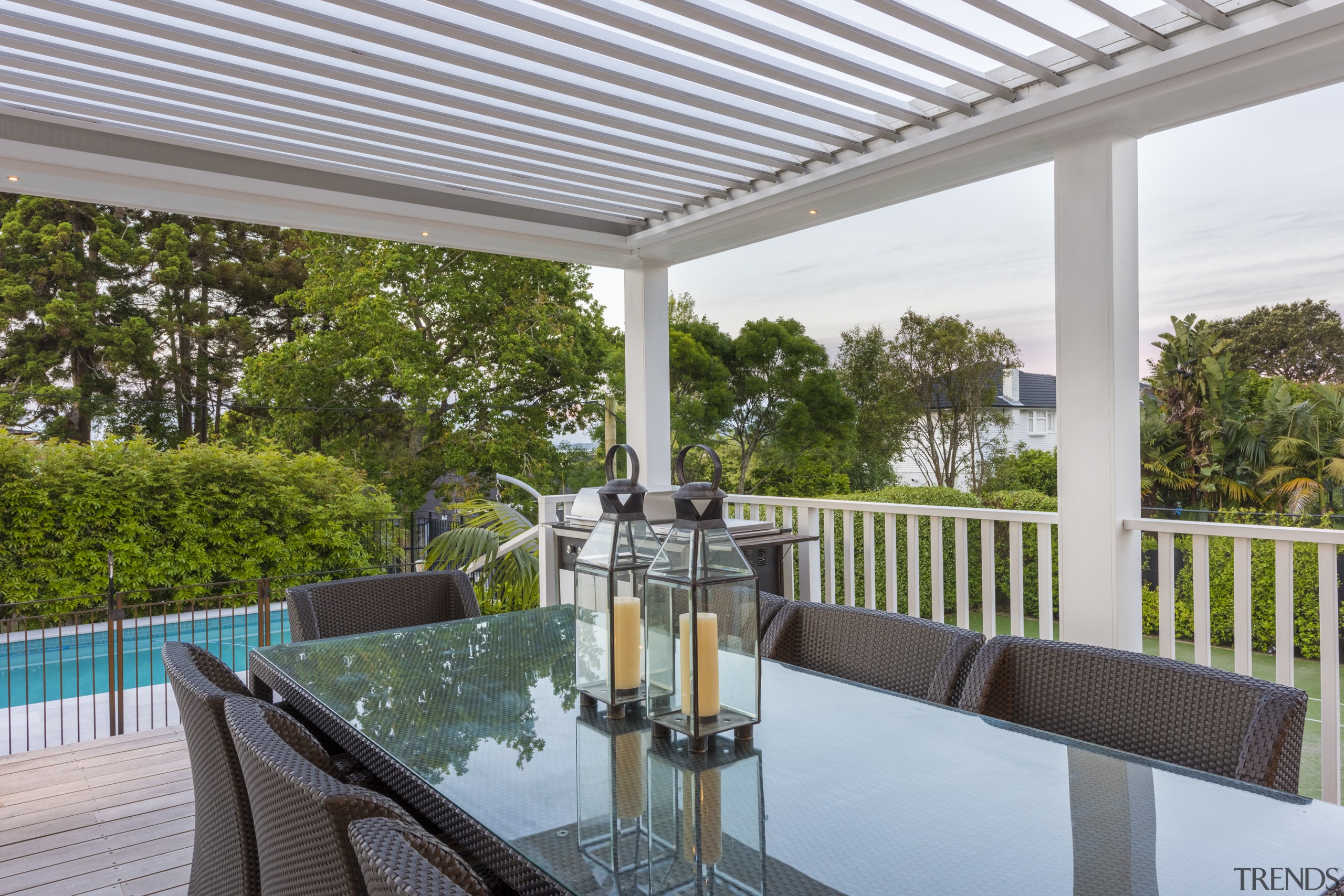 Operable shutters make the new covered side deck 