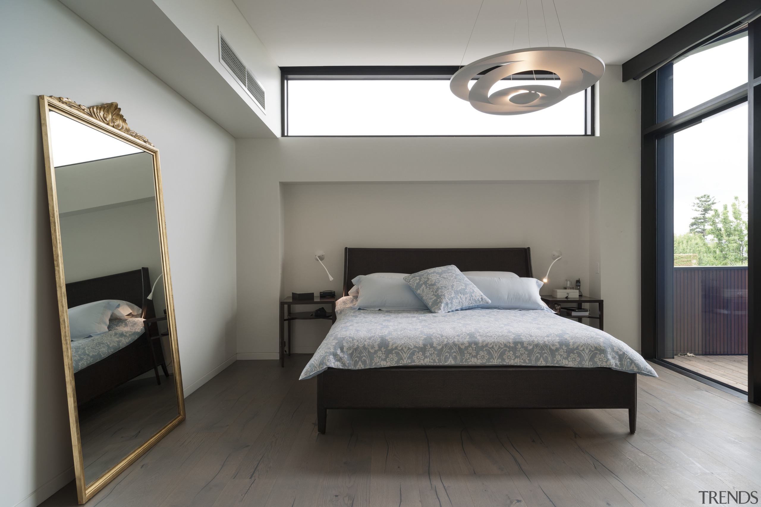 Strong contemporary lines characterise the new addition in bed, bed frame, bedroom, ceiling, floor, furniture, home, interior design, real estate, room, window, gray