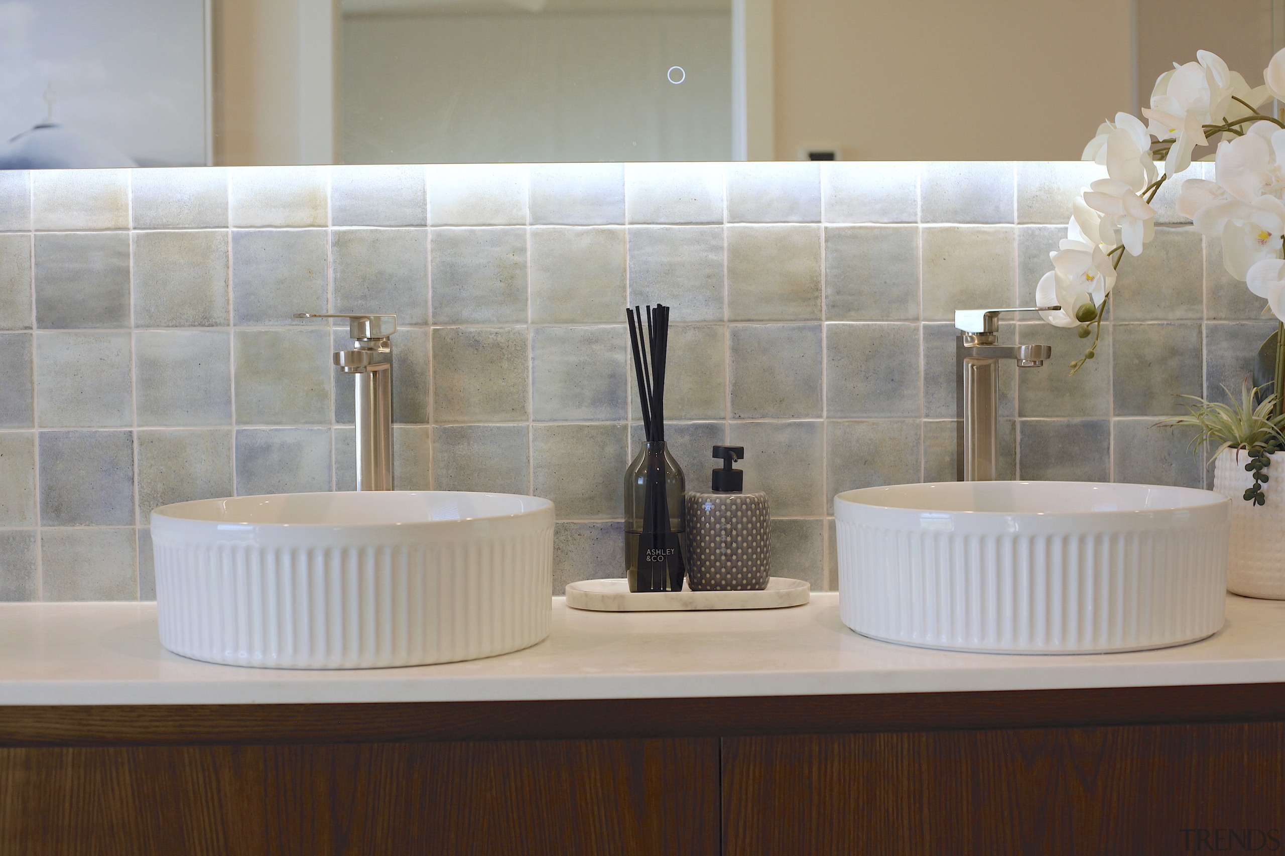 Chrome tapware provides a quiet contrast with the 