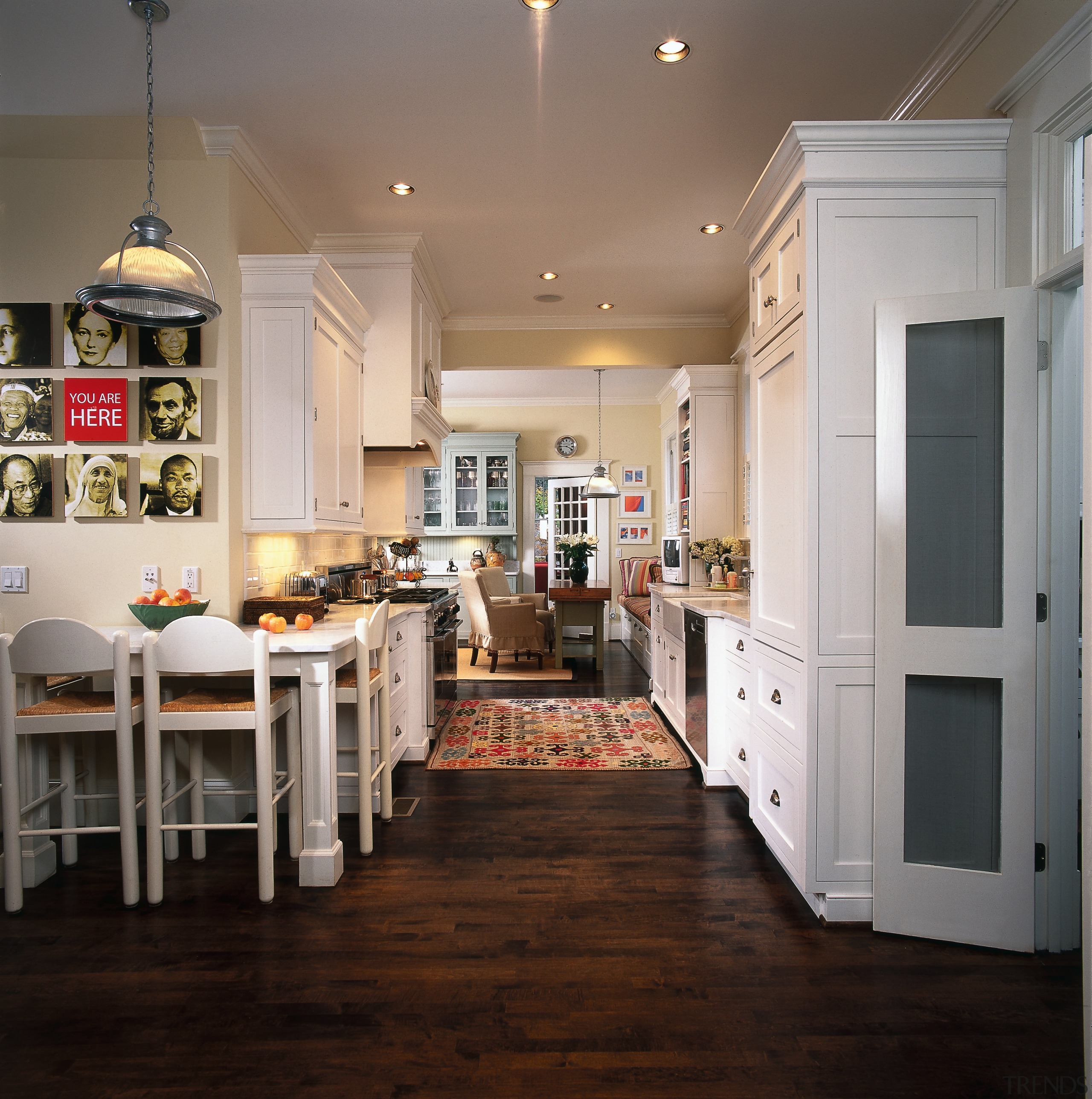 A view of the kitchen area, wooden flooring cabinetry, ceiling, countertop, cuisine classique, dining room, floor, flooring, hardwood, home, interior design, kitchen, room, wood, wood flooring, gray, black