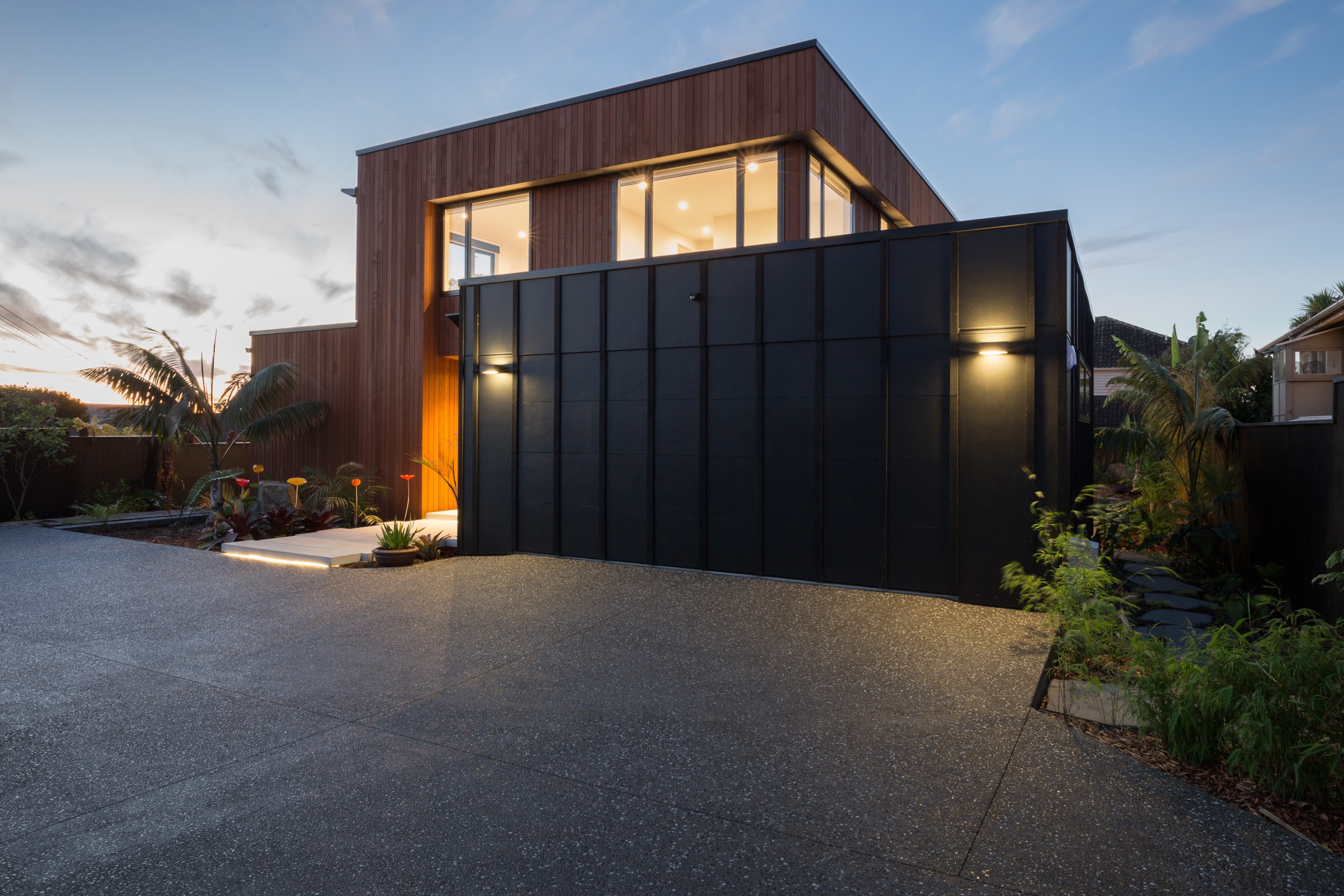 Resene Lumbersider Black was selected for this garage architecture, building, estate, facade, home, house, property, real estate, residential area, siding, sky, black