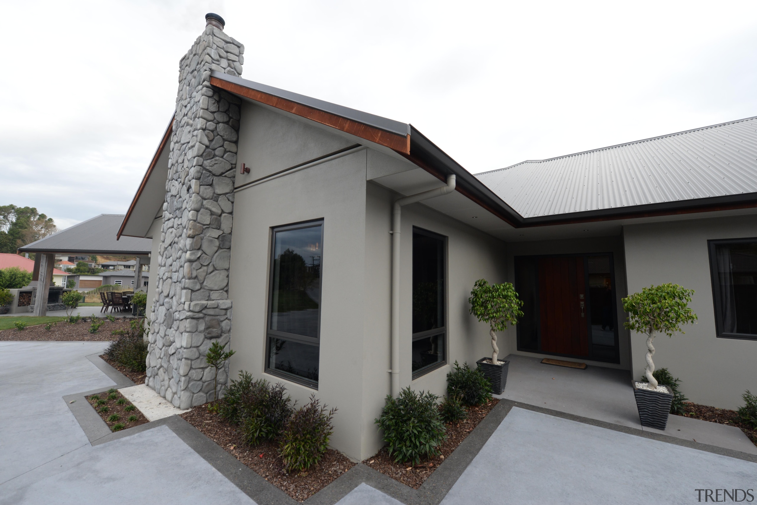 Concrete pre -cast panel home by Fowler Homes cottage, estate, facade, home, house, property, real estate, residential area, roof, window, white, gray