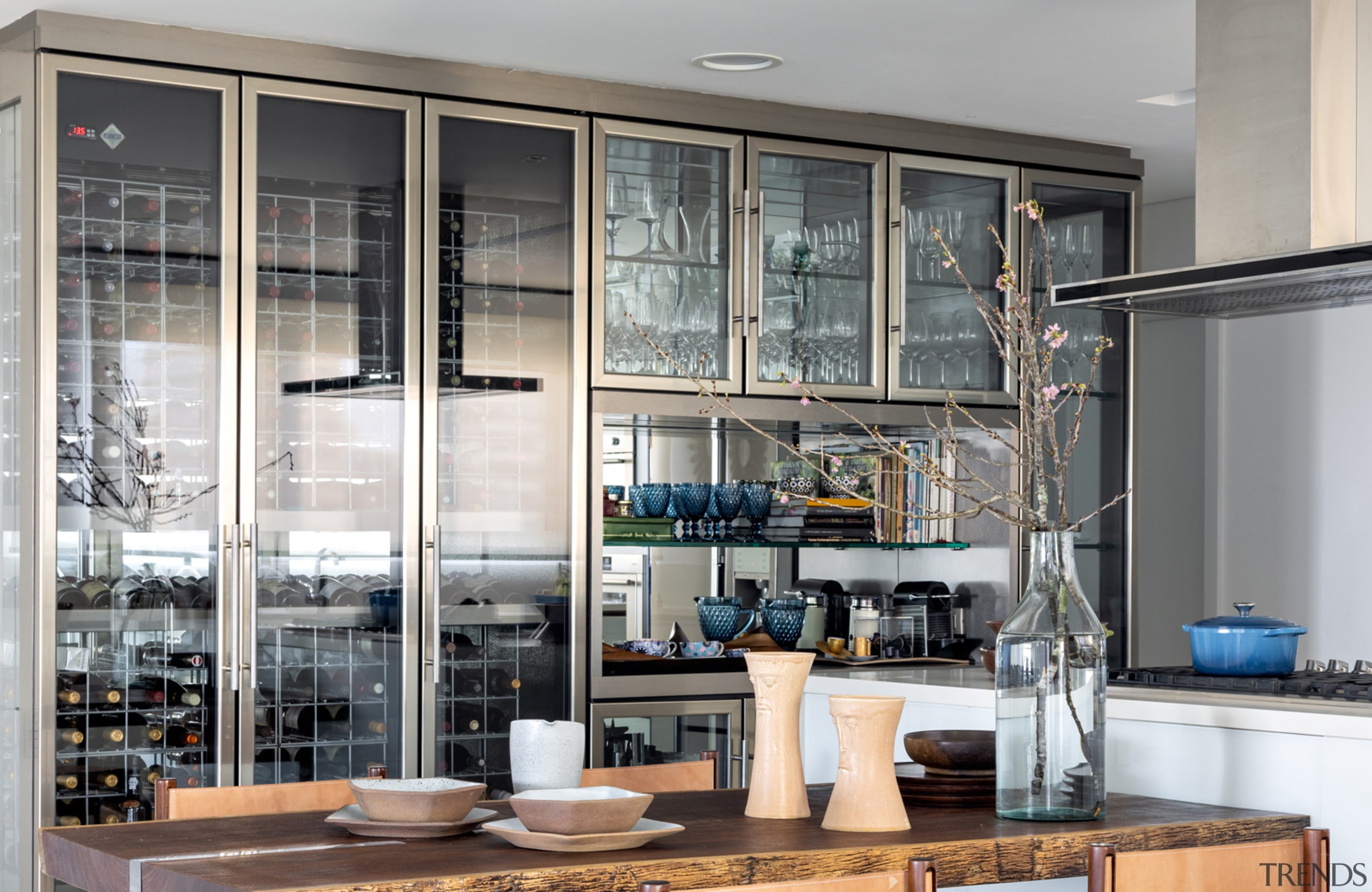 A high glass cabinet serves as both china 