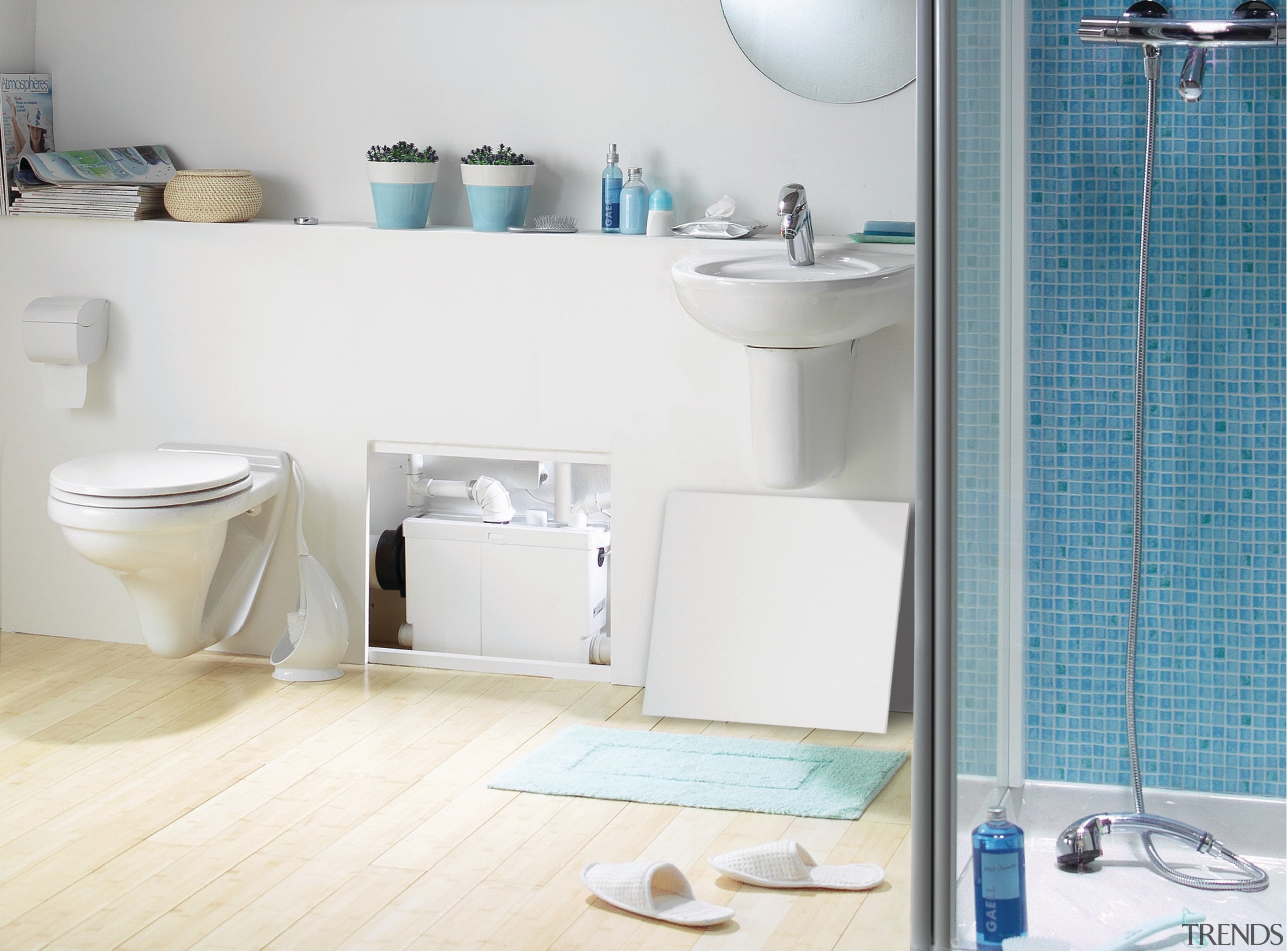 View of a bathroom which features Saniflo pumps. bathroom, bathroom accessory, bathroom cabinet, bathroom sink, ceramic, floor, interior design, plumbing fixture, product, product design, room, shelf, sink, tap, tile, toilet seat, wall, white
