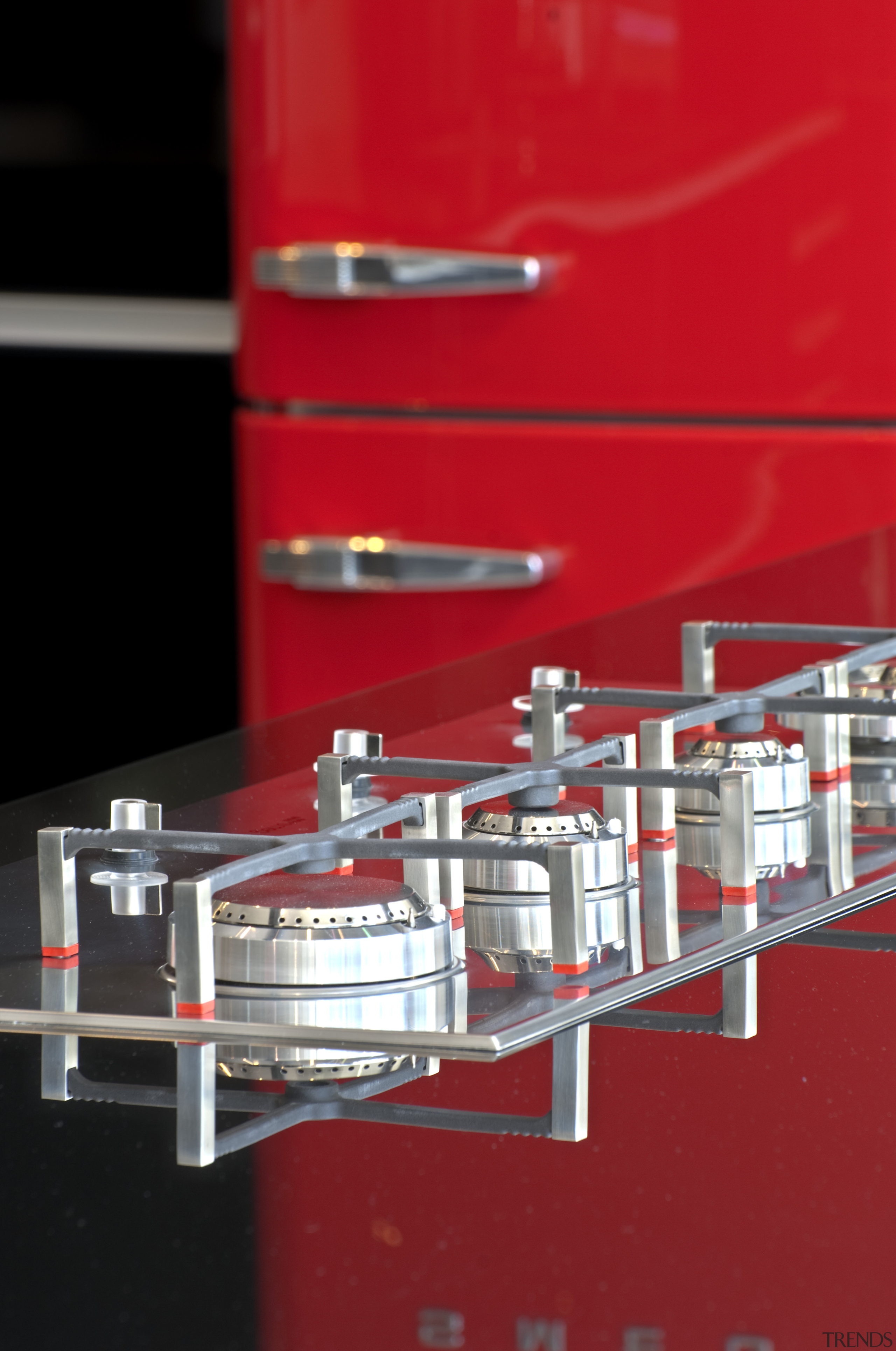 View of contemporary kitchen which features a Smeg product, product design, red, red