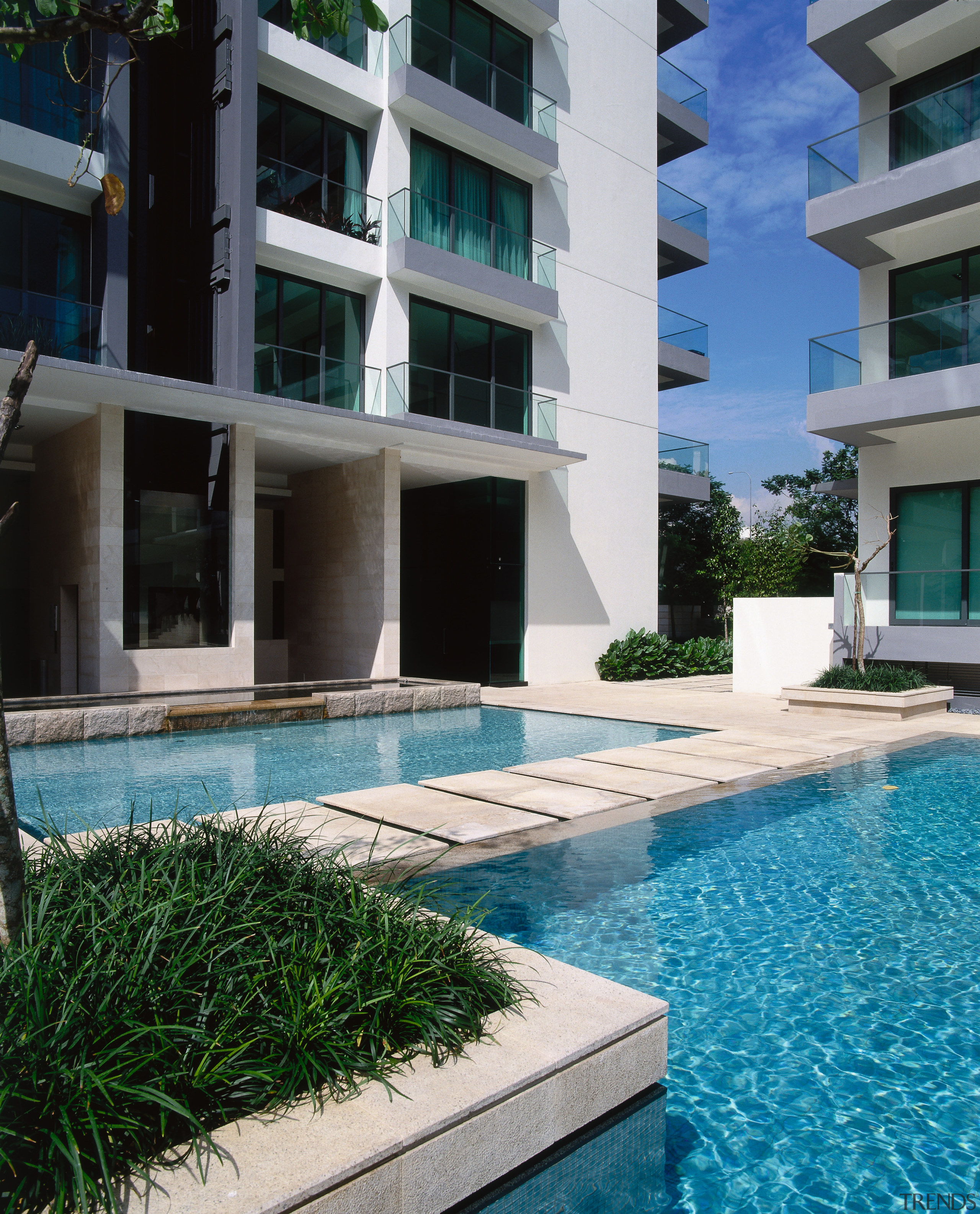 An exterior view of the swimming pool. - apartment, architecture, building, condominium, estate, facade, house, property, real estate, residential area, resort, swimming pool, black