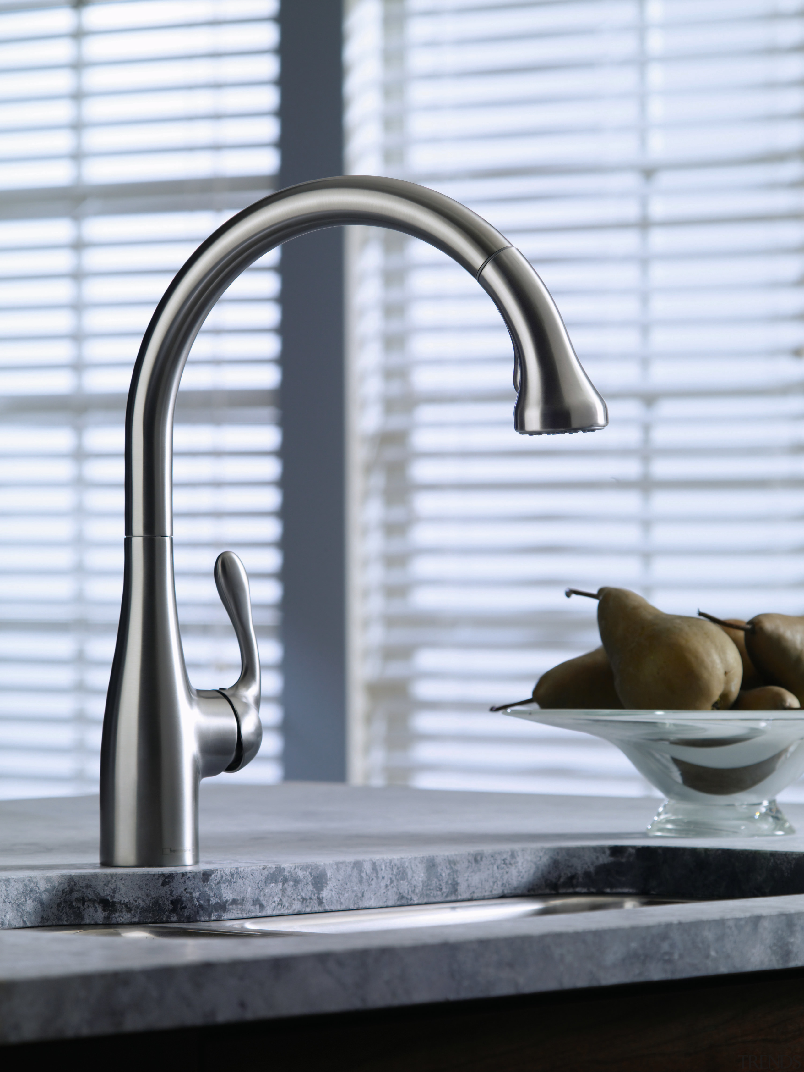 View of this kitchen featuring hansgrohe stainless steel plumbing fixture, product design, sink, tap, white