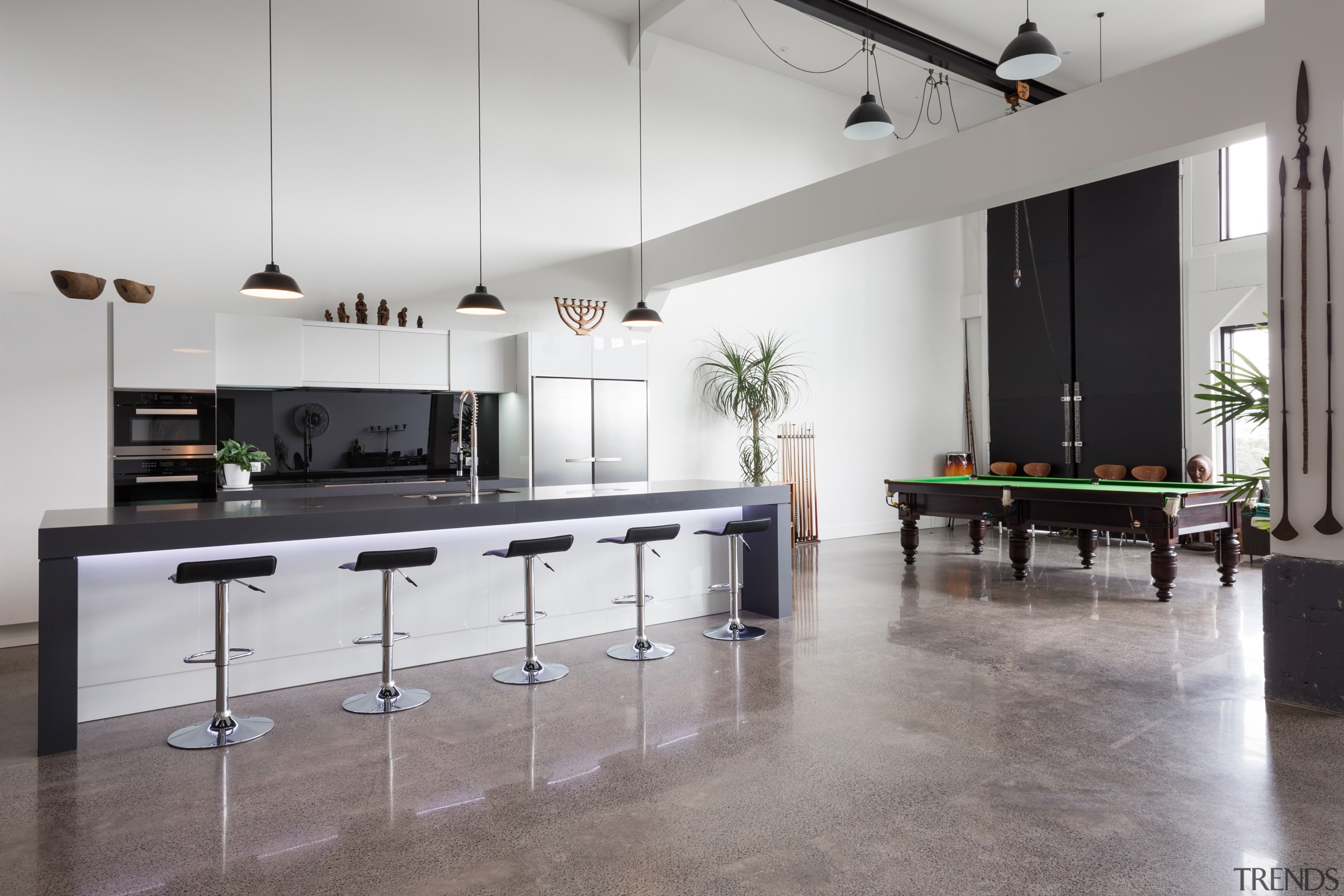 Part of a greater warehouse conversion, this kitchen countertop, floor, flooring, furniture, interior design, kitchen, product design, table, gray