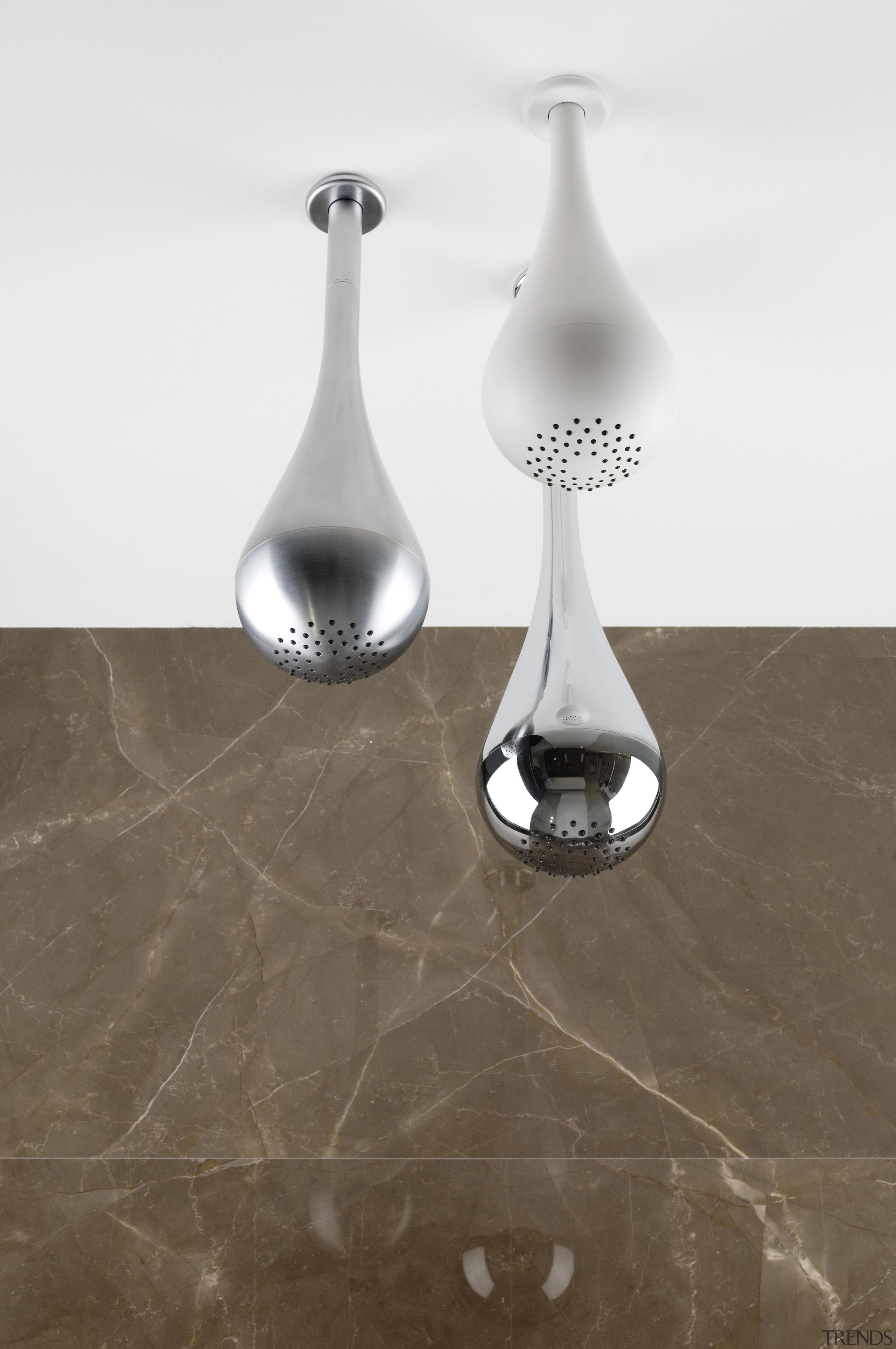 Droplet shaped Goccia shower heads add a subtle black and white, product design, still life photography, vase, gray, white