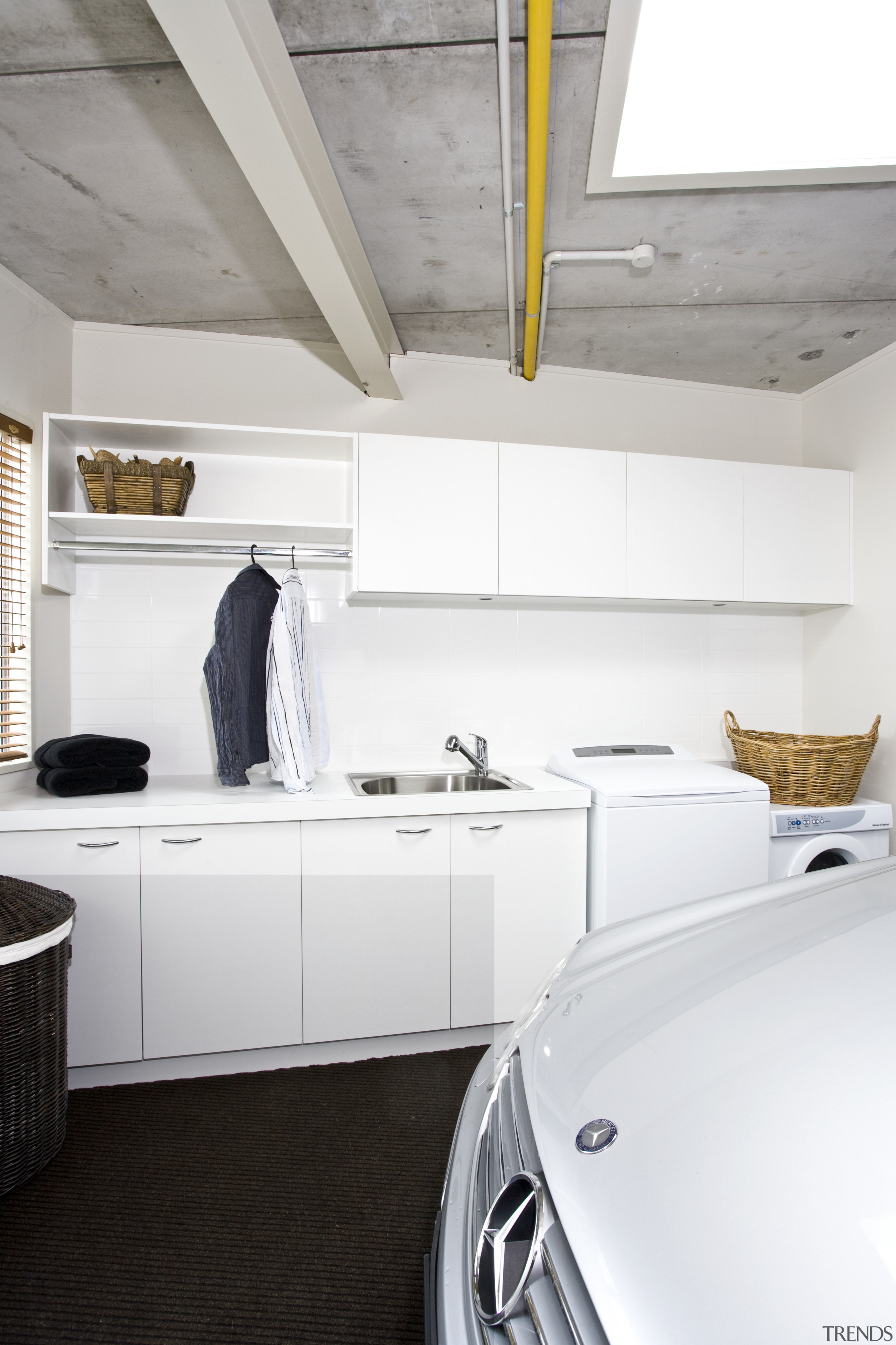 View of a laundry which was added to floor, house, interior design, kitchen, product design, room, white