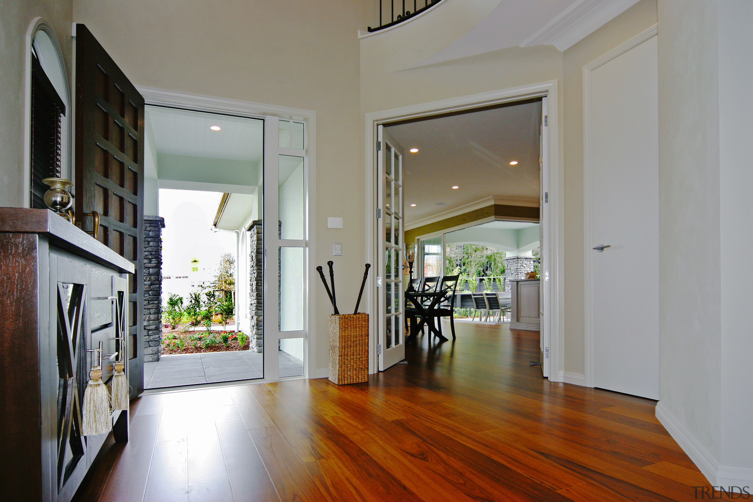 A view of a home designed and built apartment, door, estate, floor, flooring, hardwood, home, house, interior design, laminate flooring, property, real estate, window, wood, wood flooring, gray