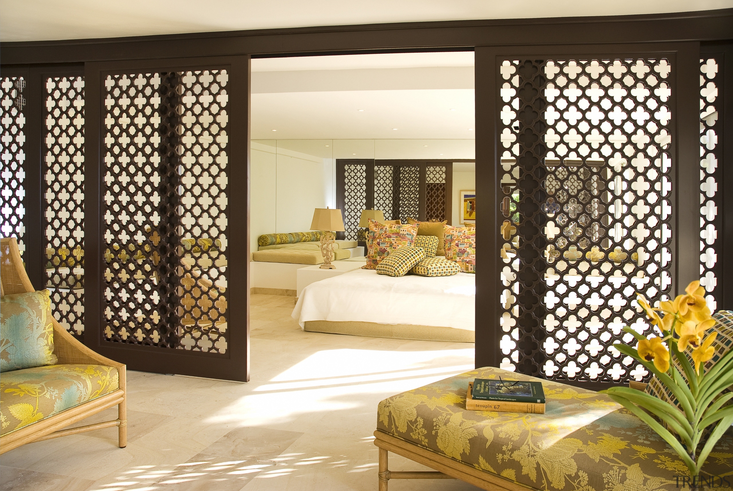 This home was designed by Geoffrey Bradfield. Here curtain, door, home, interior design, living room, room, wall, window, window blind, window covering, window treatment, orange, brown