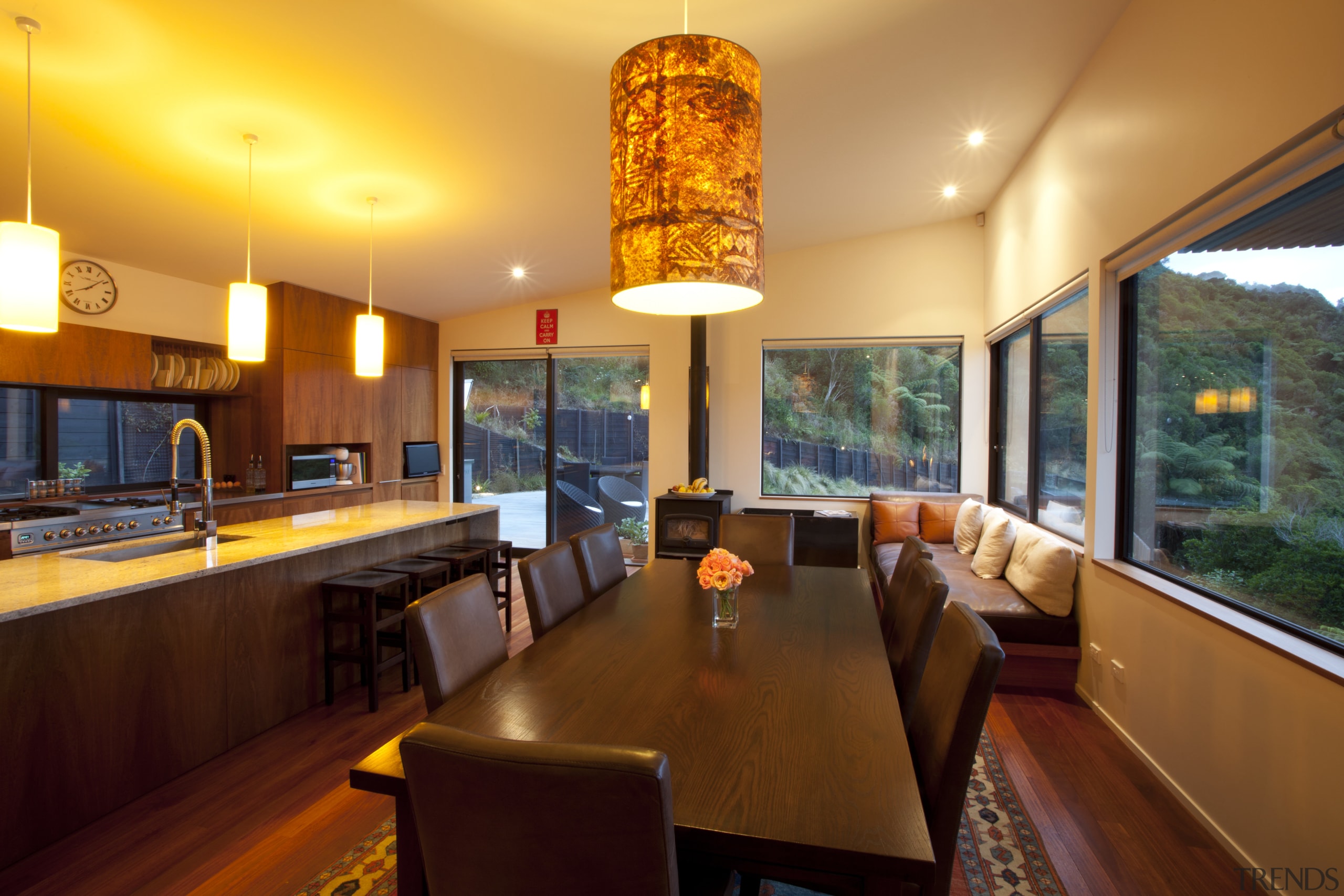 This kitchen in a waterfront home combines sapele ceiling, dining room, interior design, real estate, restaurant, orange