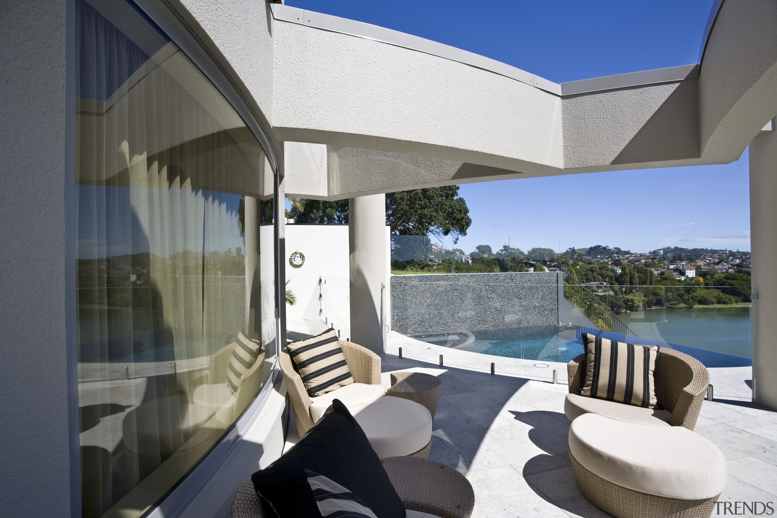 View of a curved glass balustrade from Glasshape. gray