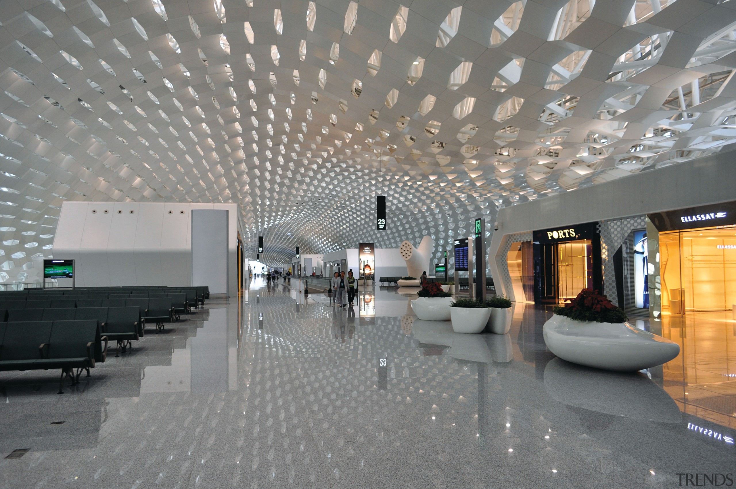 Looking much like a giant sculpture from both airport terminal, architecture, ceiling, daylighting, interior design, lobby, gray