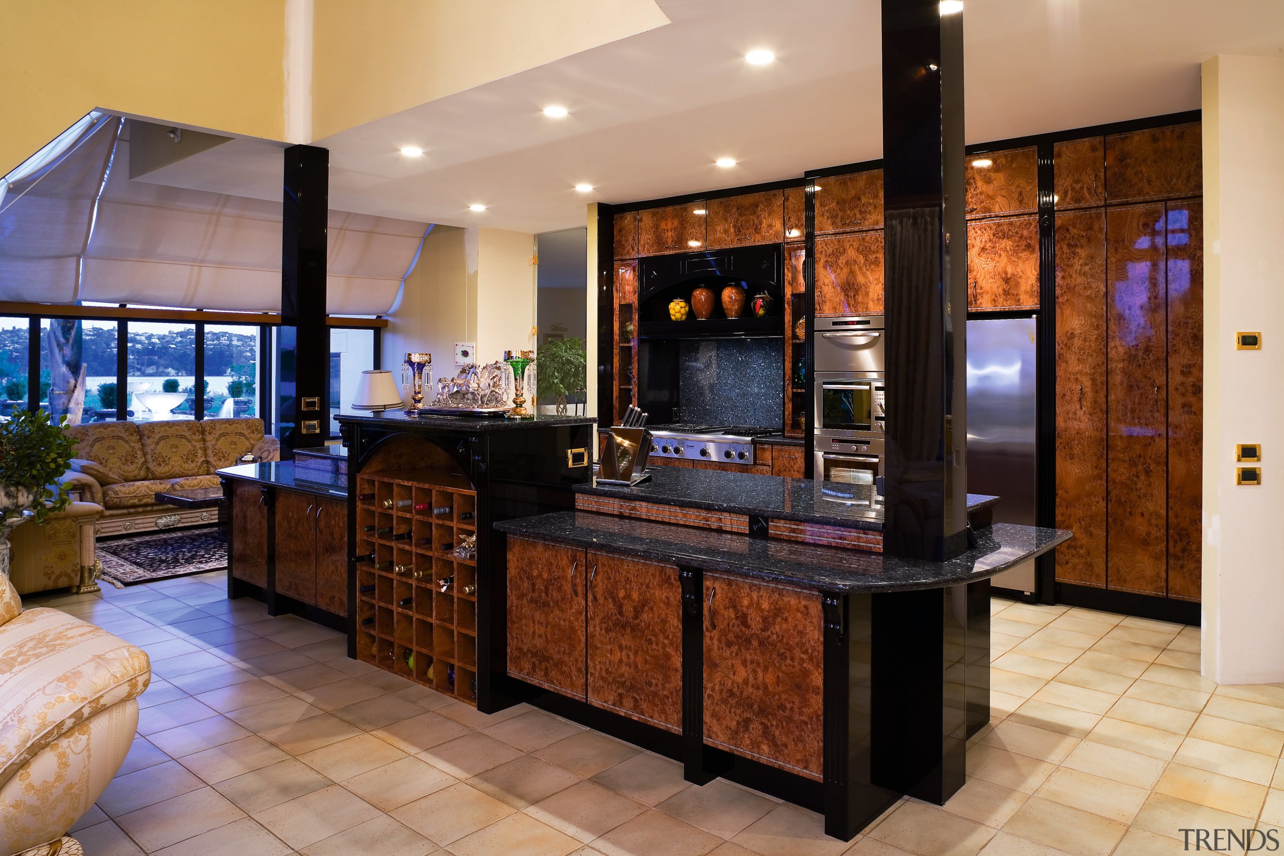 View of this kitchen featuring tiled flooring, lacquered countertop, flooring, interior design, kitchen, lobby, real estate, room, orange, brown