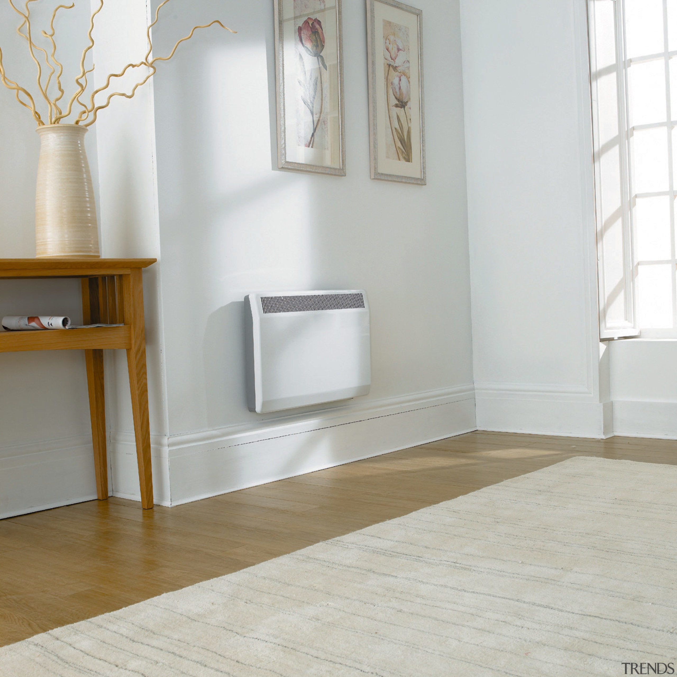 Wall mounted white panel heater in room with floor, flooring, furniture, hardwood, interior design, laminate flooring, product, product design, tap, tile, wall, wood, wood flooring, gray, white